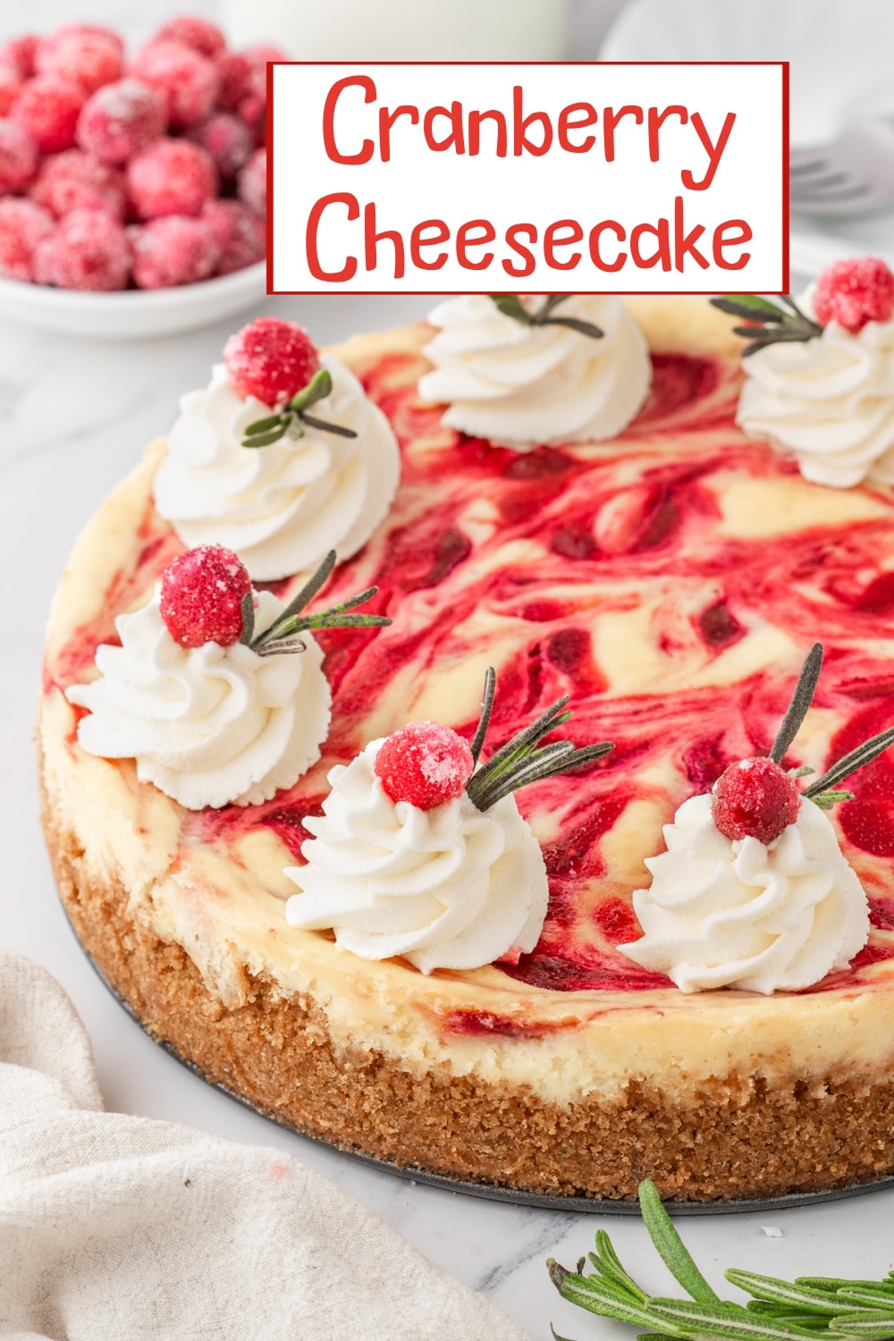 This cranberry cheesecake is creamy, sweet, and topped with a tangy cranberry sauce. It’s the perfect dessert for holiday gatherings or just because! via @cmpollak1