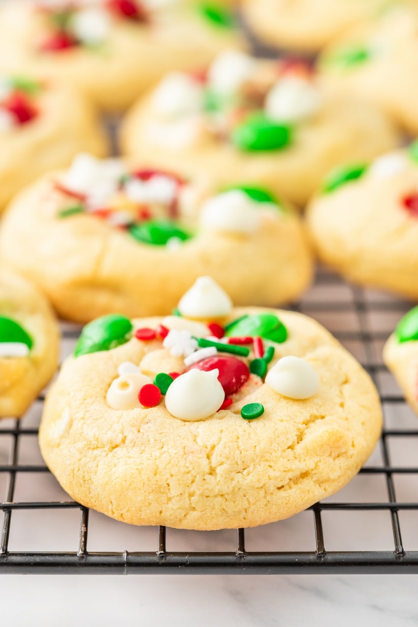 Enjoy the season with these merry cookies packed with green and red M&M's, white chocolate chips, and a flurry of holiday sprinkles. Don't forget to share the love with Santa and leave him a treat as sweet as the spirit of giving—because even the big guy deserves a taste of happiness on Christmas Eve. M&M cookies