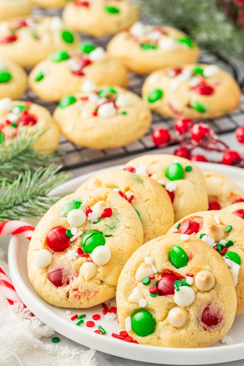Enjoy the season with these merry cookies packed with green and red M&M's, white chocolate chips, and a flurry of holiday sprinkles. Don't forget to share the love with Santa and leave him a treat as sweet as the spirit of giving—because even the big guy deserves a taste of happiness on Christmas Eve. red and green cookies for christmas
