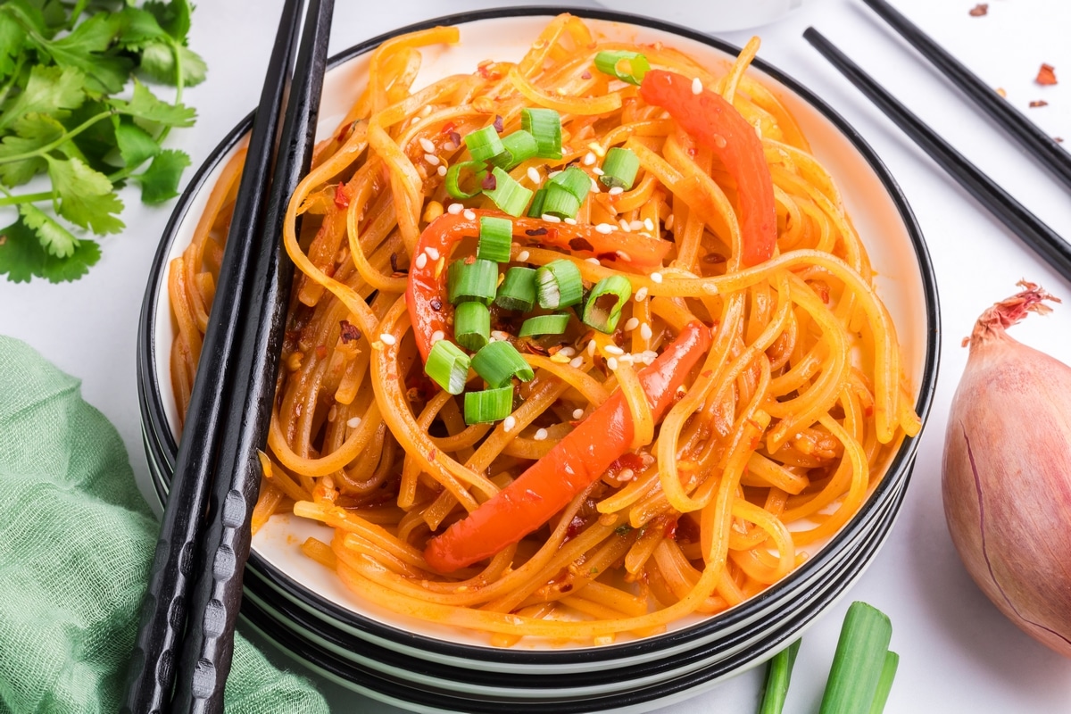 Chili garlic noodles, a quick and delicious side dish recipe tossed in a spicy-fragrant chili garlic sauce. Perfect for a busy weeknight and packed with so much flavor. I love making this noodle dish. garlic chili noodles