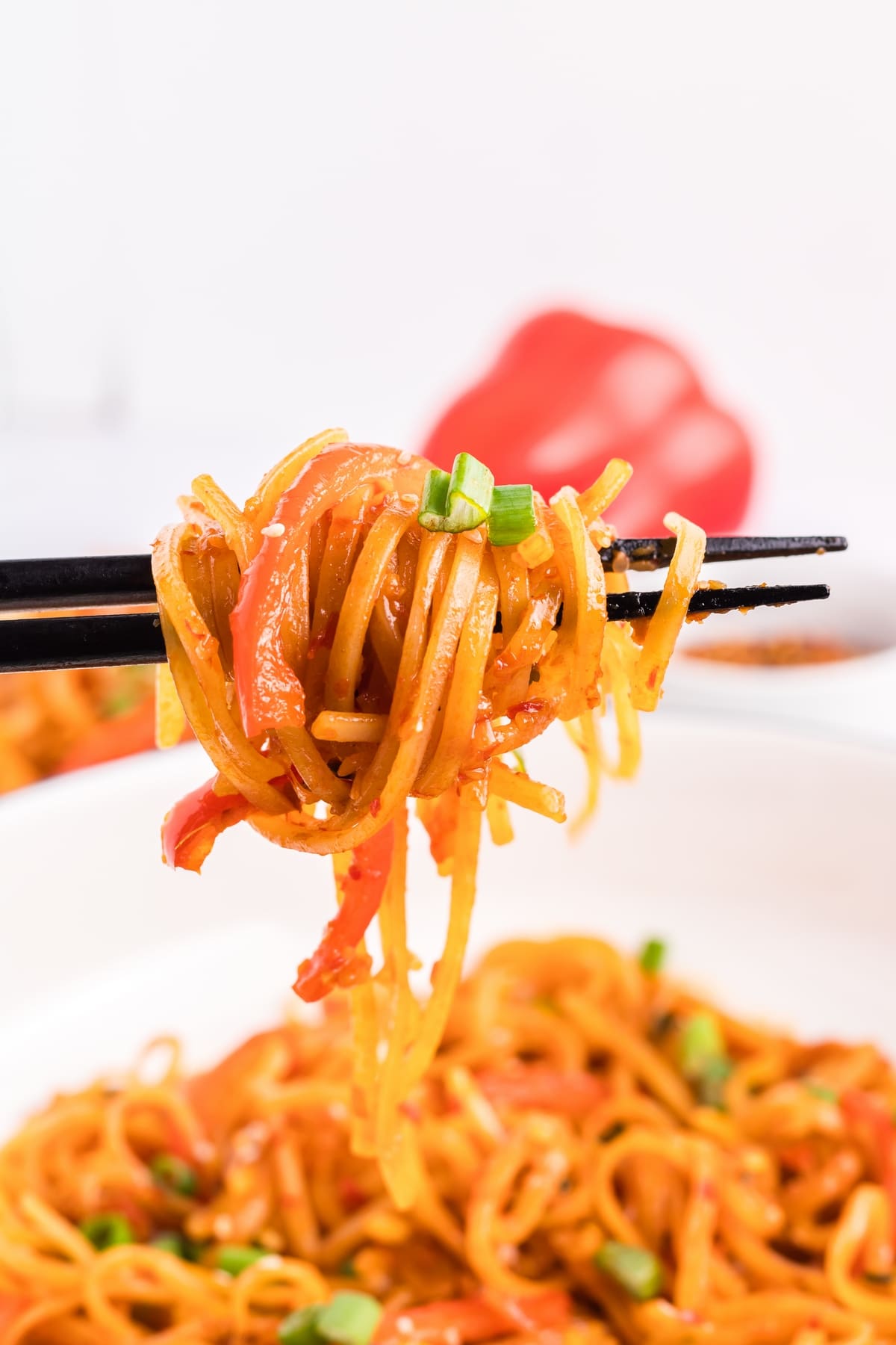 Chili garlic noodles, a quick and delicious side dish recipe tossed in a spicy-fragrant chili garlic sauce. Perfect for a busy weeknight and packed with so much flavor. I love making this noodle dish. spicy chili garlic noodles