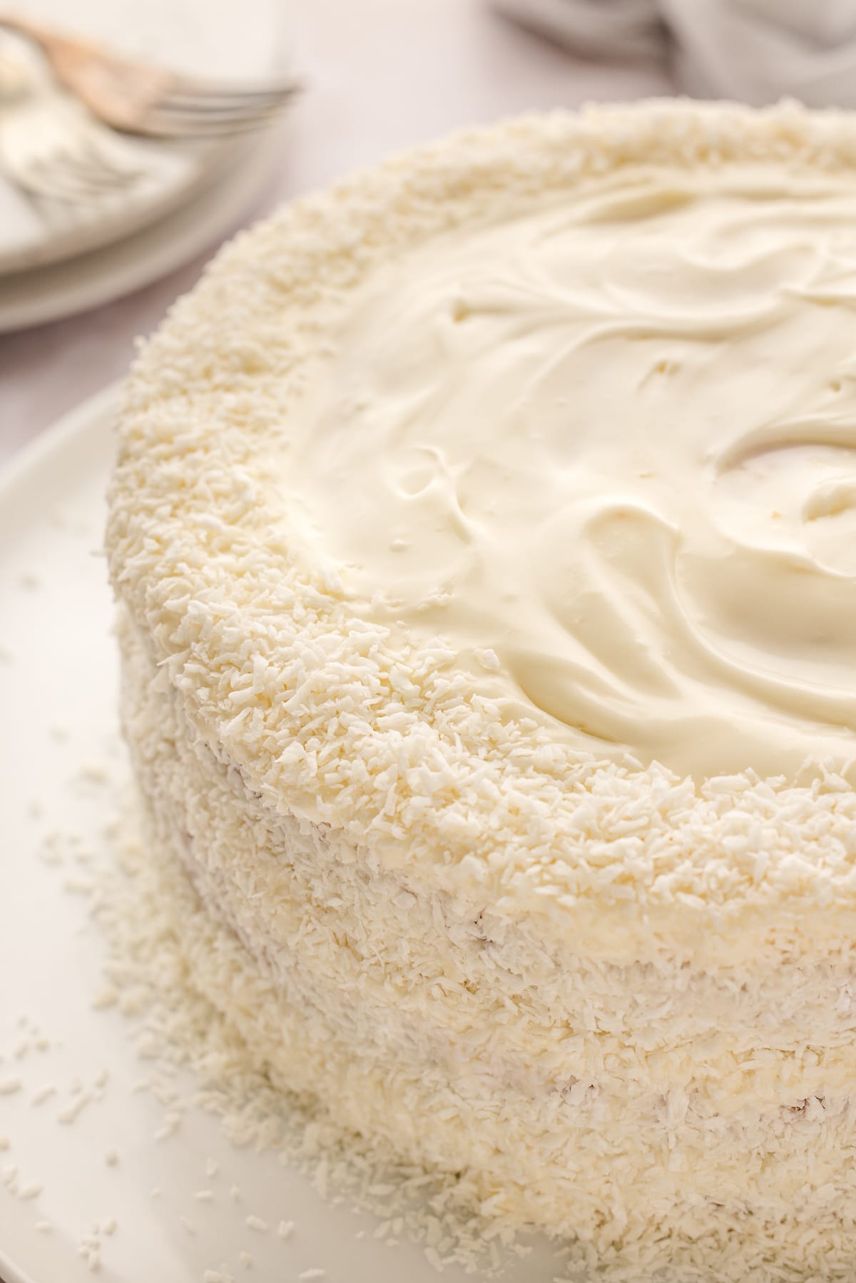 This pineapple coconut cake is a tropical-flavored dream dessert. It's the perfect blend of sweet pineapple and nutty coconut in every bite. coconut pineapple cake