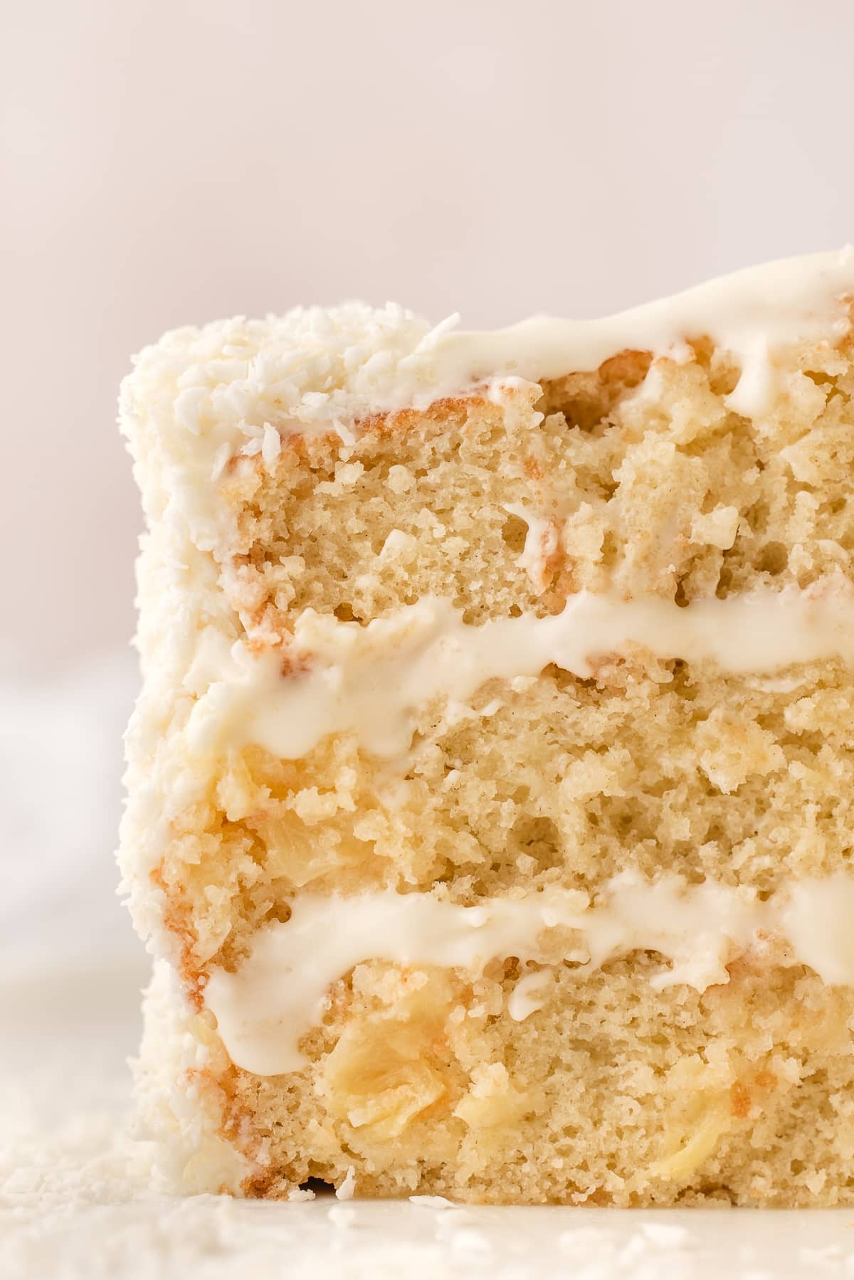 This pineapple coconut cake is a tropical-flavored dream dessert. It's the perfect blend of sweet pineapple and nutty coconut in every bite. pineapple coconut cake
