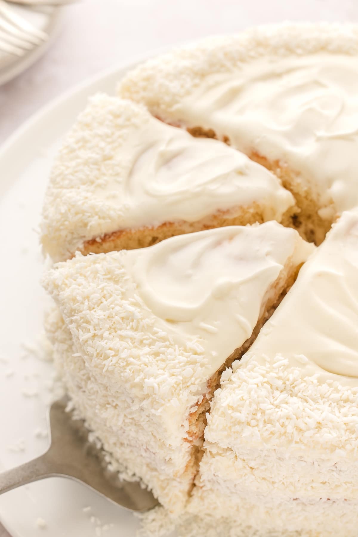 This pineapple coconut cake is a tropical-flavored dream dessert. It's the perfect blend of sweet pineapple and nutty coconut in every bite. pina colada cake
