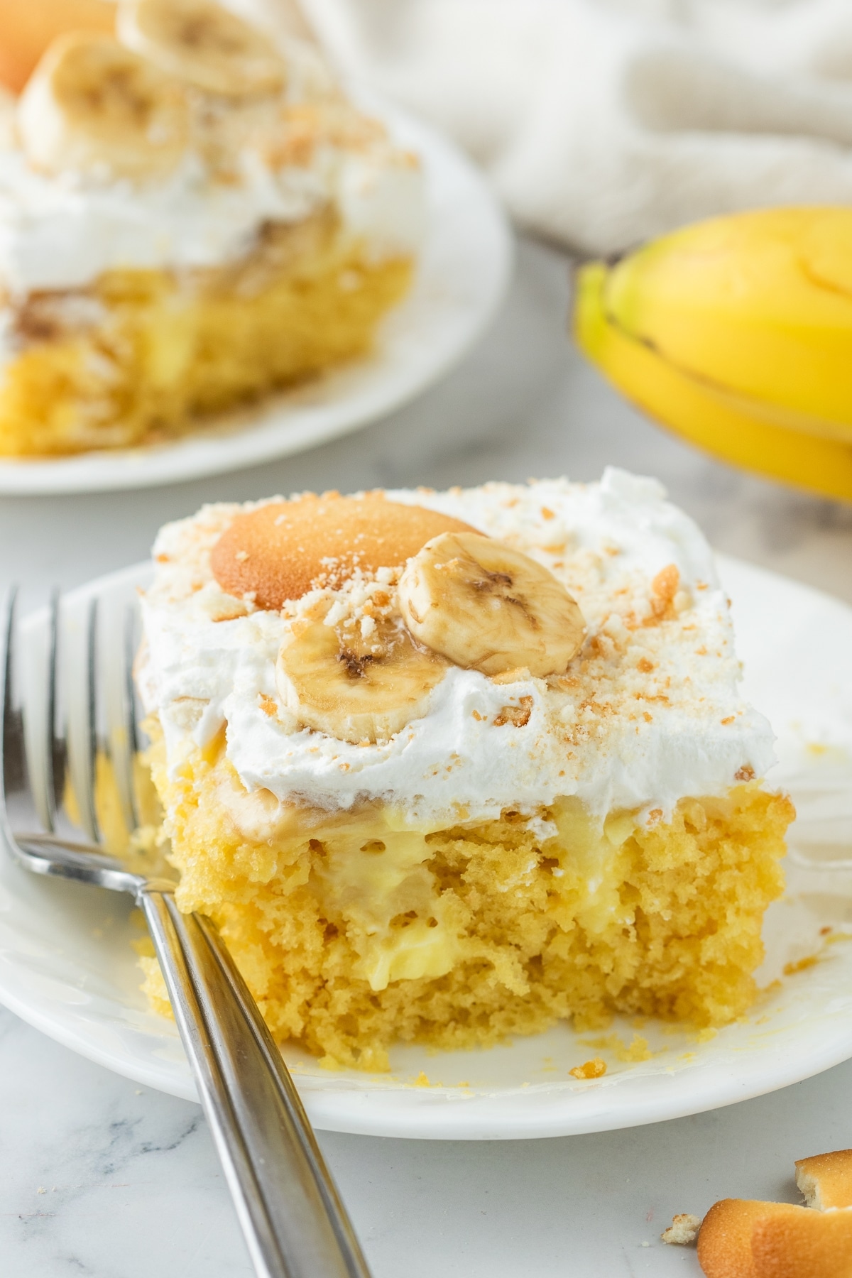 The perfect dessert for banana lovers: banana pudding poke cake. This heavenly treat combines creamy pudding, moist cake, and sweet bananas. banana pudding poke cake
