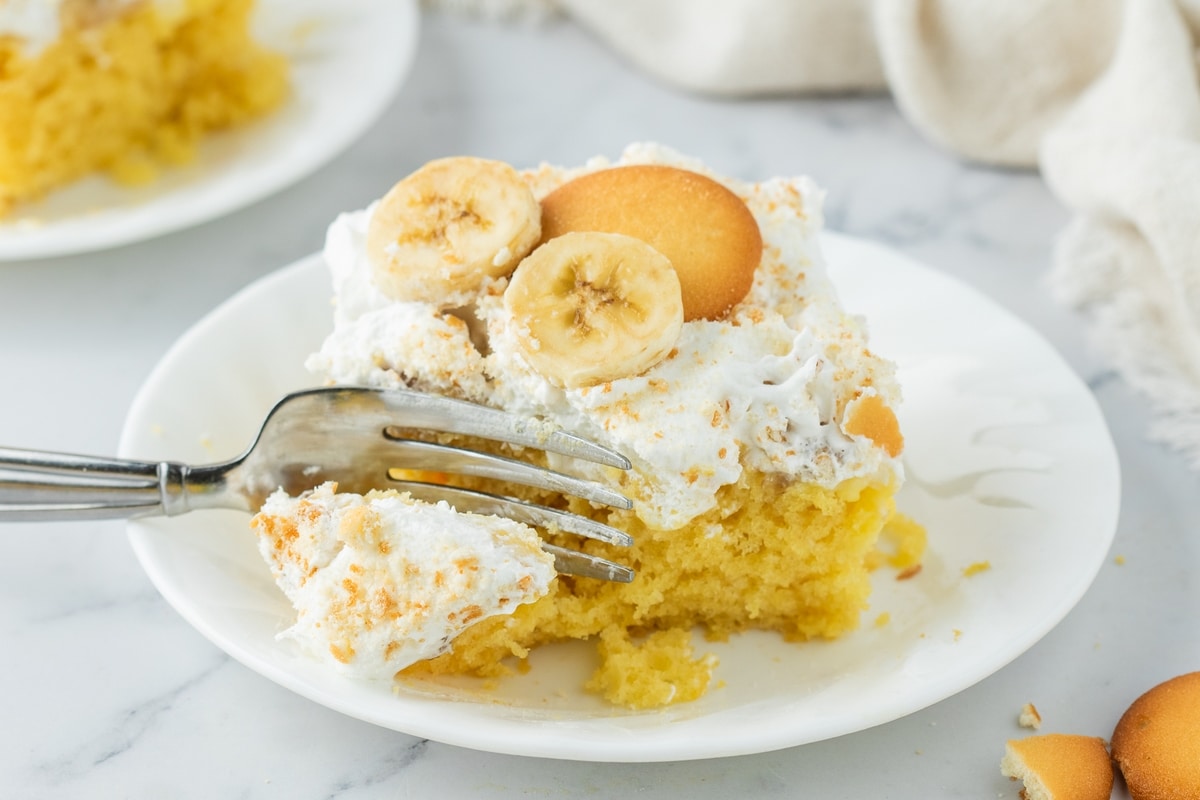The perfect dessert for banana lovers: banana pudding poke cake. This heavenly treat combines creamy pudding, moist cake, and sweet bananas. banana poke cake
