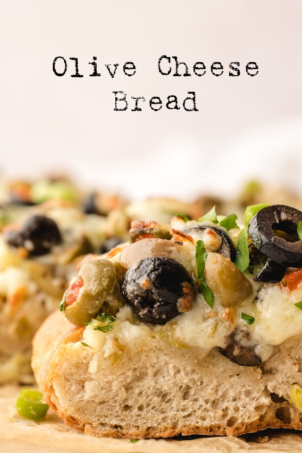 Indulge in this irresistible olive cheese bread recipe. Perfect as a party appetizer or a side dish for your favorite main course. via @cmpollak1