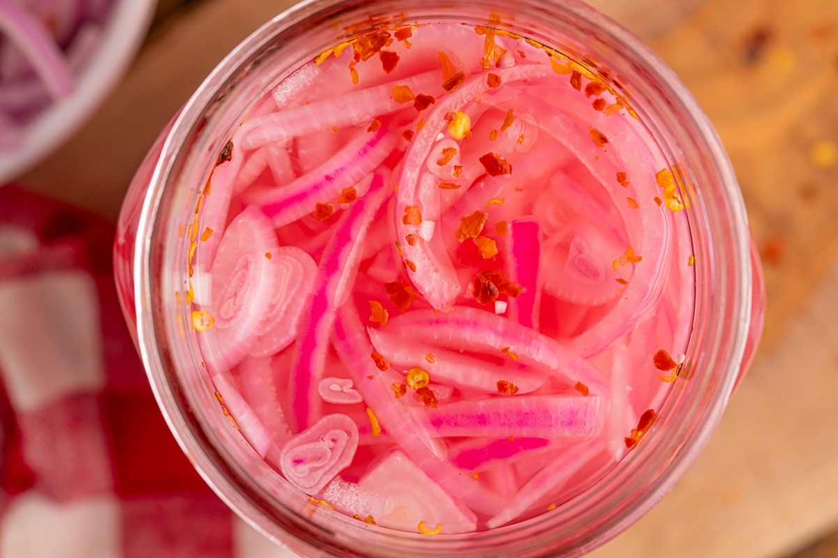 Spice up your meals with homemade pickled red onions. Learn how to make this quick and easy condiment that adds a burst of flavor. pickled red onions recipe