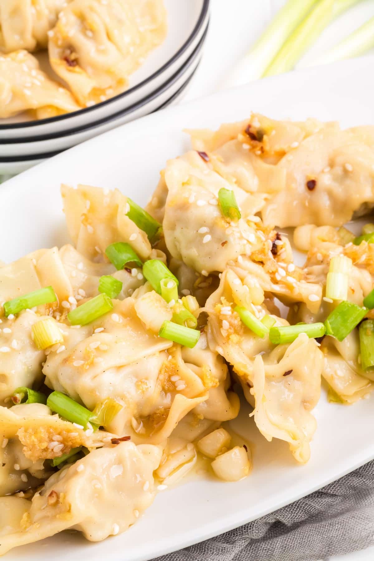 Spice up your meal with these mouthwatering spicy wontons! Made with fresh garlic, ginger, and a blend of seasonings, they're a crowd-pleaser. wonton dipping sauce