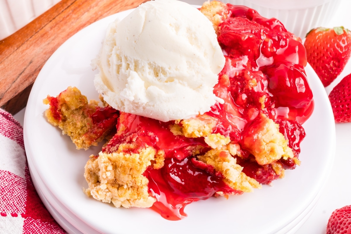 Make this quick and easy strawberry dump cake recipe. Top it off with creamy vanilla ice cream for an irresistible dessert. dump cake