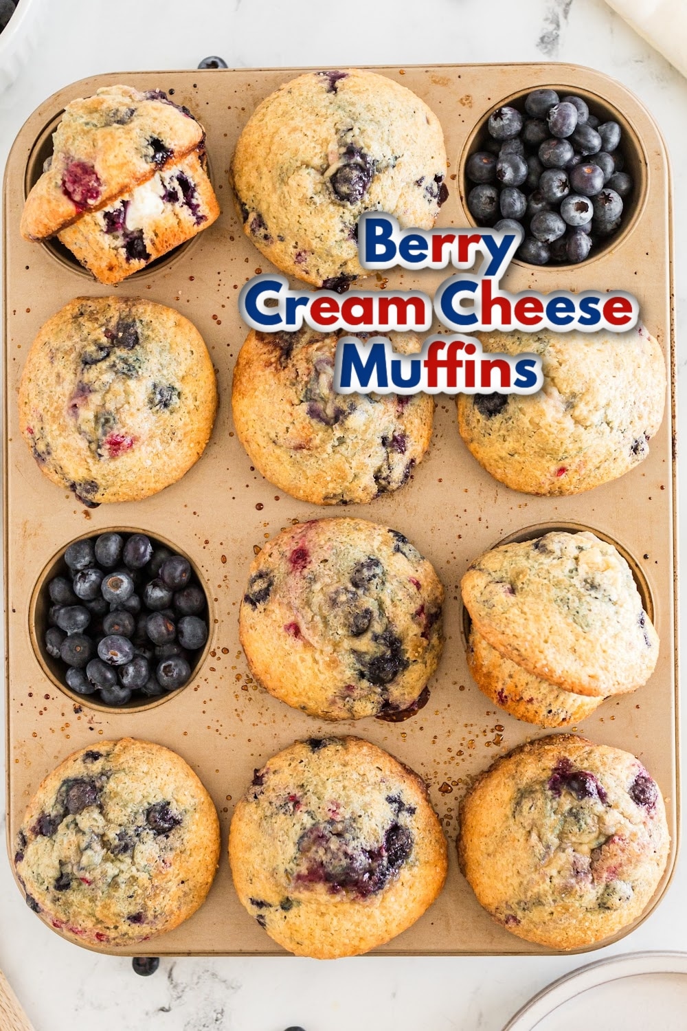 Tender berry muffins that aren't too sweet, with a light and airy texture and chunks of cream cheese baked into every bite. via @cmpollak1