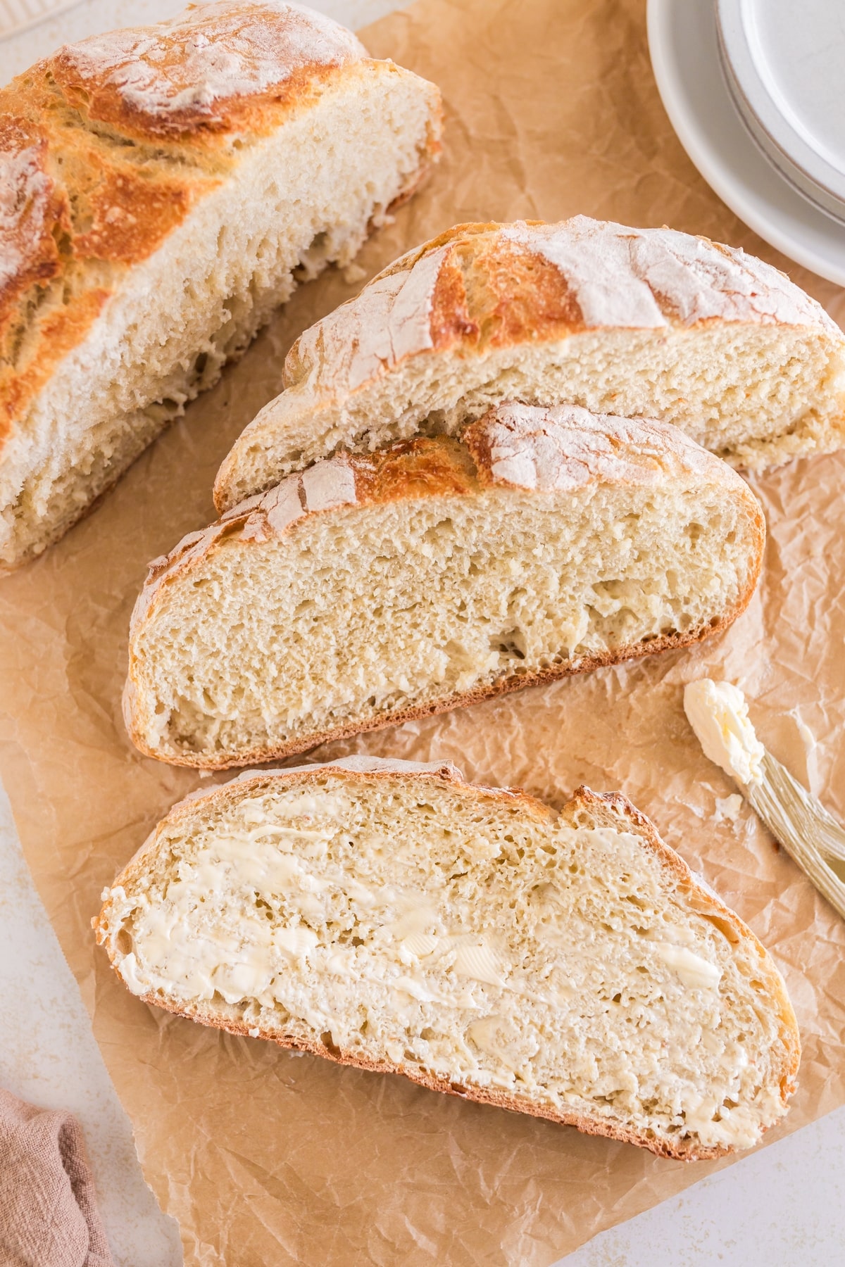 This Dutch oven bread is my simplest bread recipe to bake at home. With no kneading required, no starter to make, no mixer, and no special skills needed, you'll soon be making it daily. bread slices