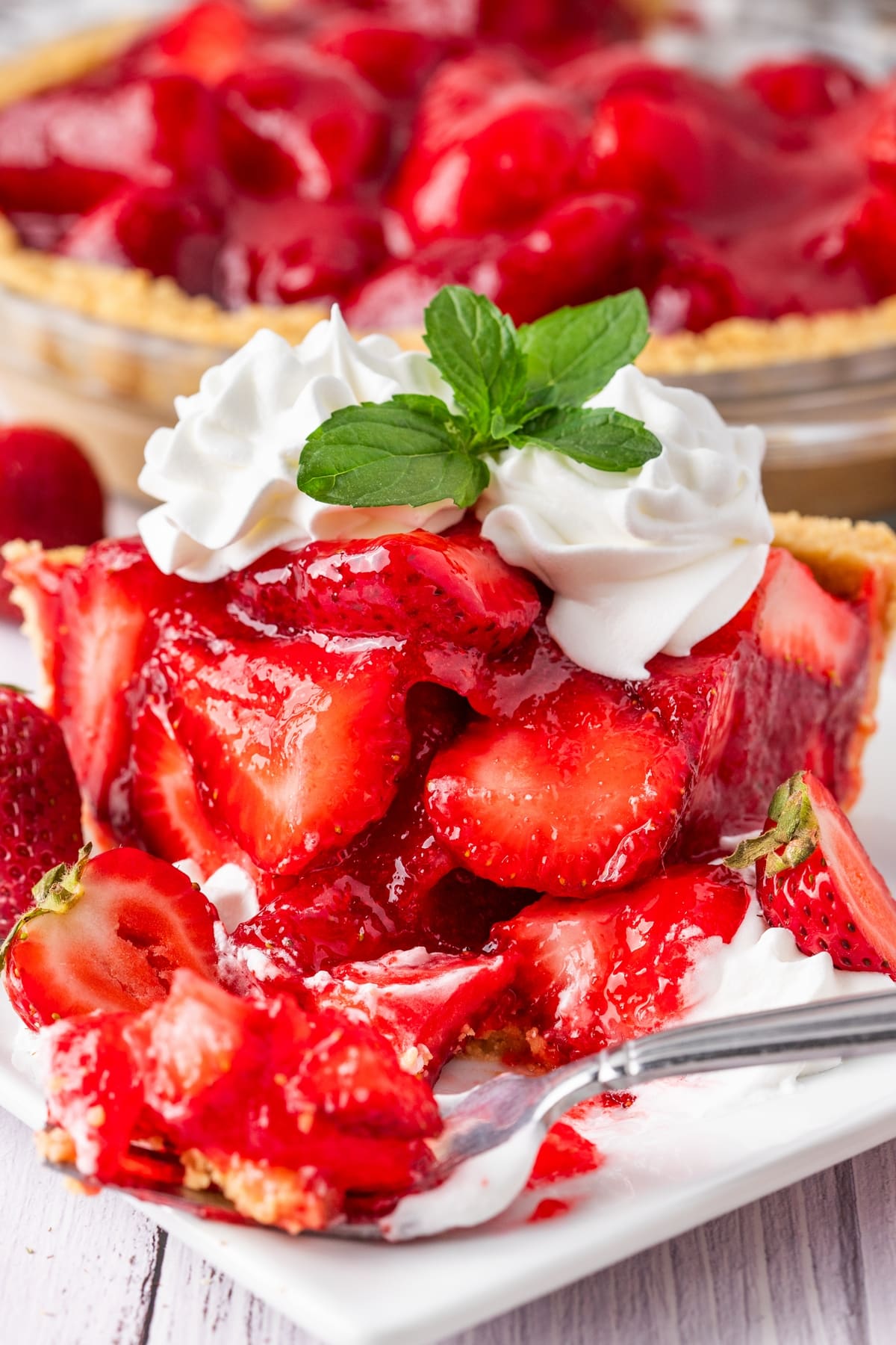 Satisfy your sweet tooth with a delicious fresh strawberry pie. This easy no-bake dessert is perfect for summer. no bake glazed strawberry pie