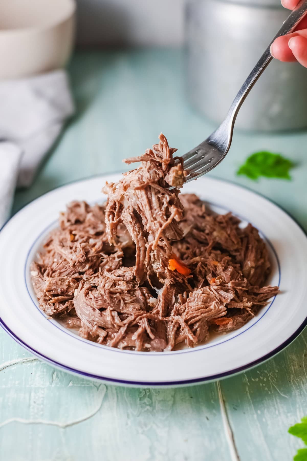 Learn how to make my mouthwatering Instant Pot barbacoa beef. Use it for tacos, burritos, and more! It's so tasty! I often throw it together on a weekend afternoon and use it in various recipes throughout the week! instant pot barbacoa