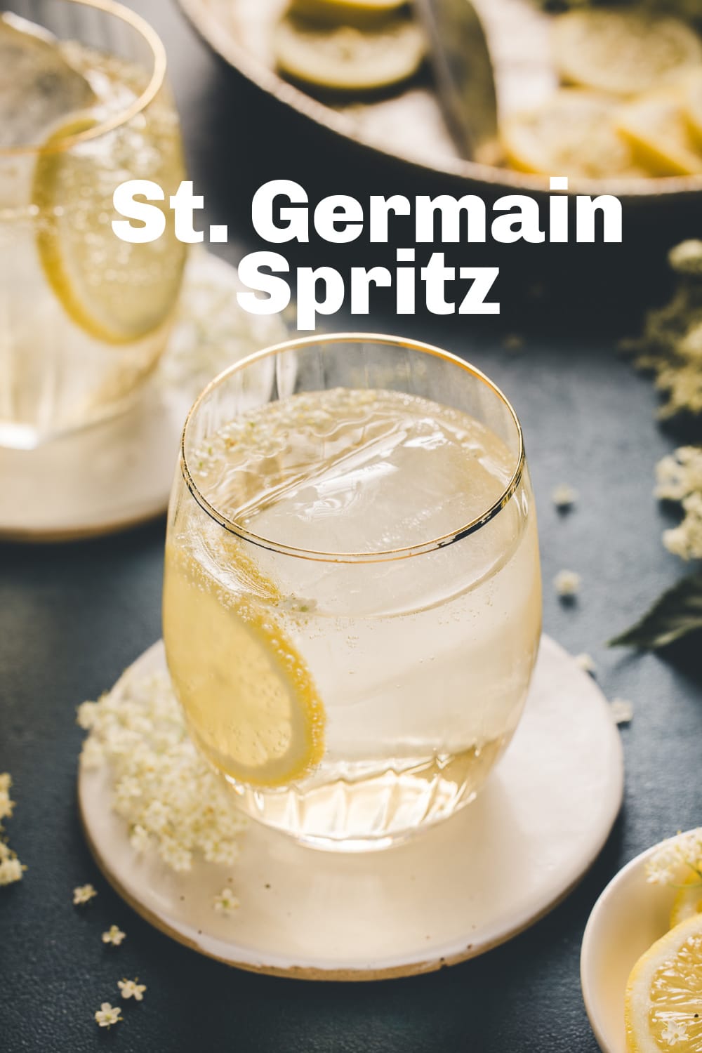 This St. Germaine cocktail is the perfect summer spritzer for a balmy evening on the patio. It's also elegant enough for a bridal shower or garden party soiree. via @cmpollak1