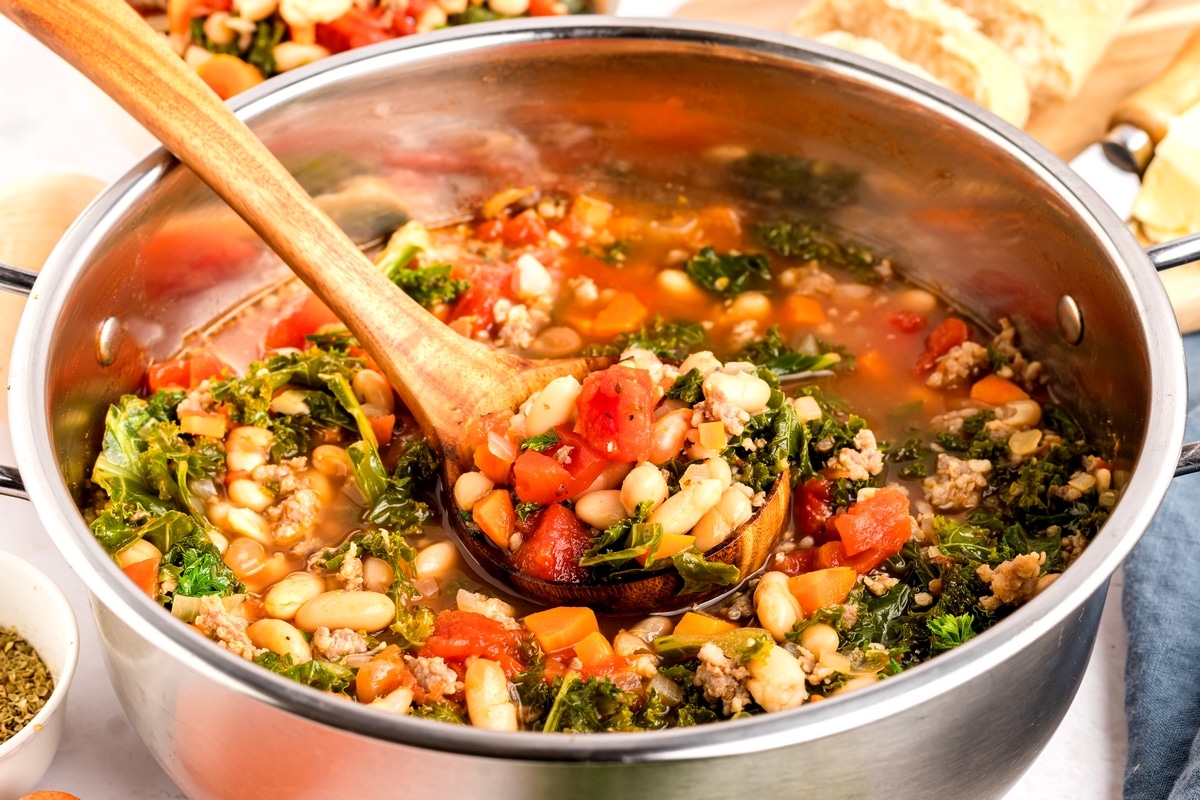 This kale and white bean sausage soup is one of my go-to comfort dinners. The combination of Italian sausage, garlic, and other seasonings makes this 30-minute soup taste like it’s been simmering on the stove all day. kale and bean soup