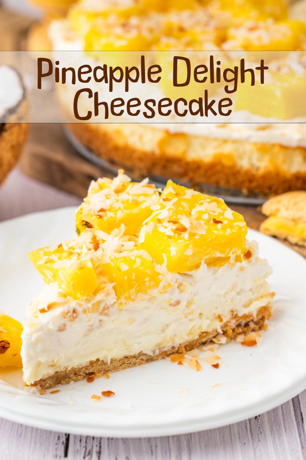 You'll love the tropical flavors of this pineapple delight cheesecake, featuring a golden Oreo crust, rich cream cheese layer, and fluffy pineapple mousse, topped with fresh pineapple and coconut. It's perfect for any gathering, from barbecues to potlucks. via @cmpollak1