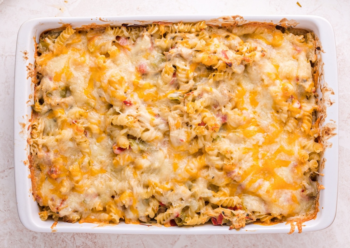  Overhead view of hot and cheesy chicken casserole with Hatch chiles, ready to serve