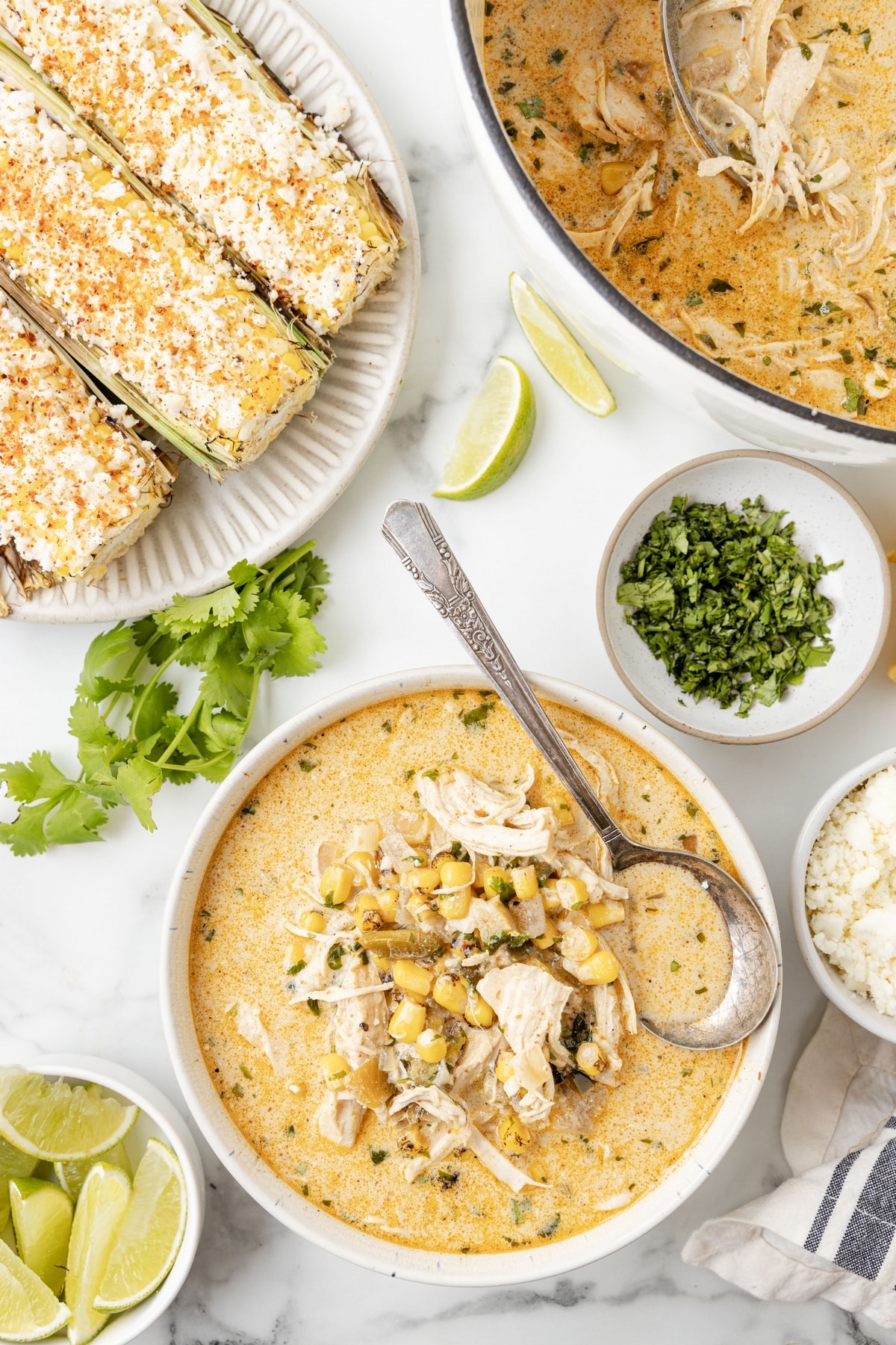 This Mexican Street Corn Soup is inspired by elote, bringing all those bold, zesty flavors into a cozy, comforting bowl. It's like eating favorite street food with a spoon. Mexican street corn soup