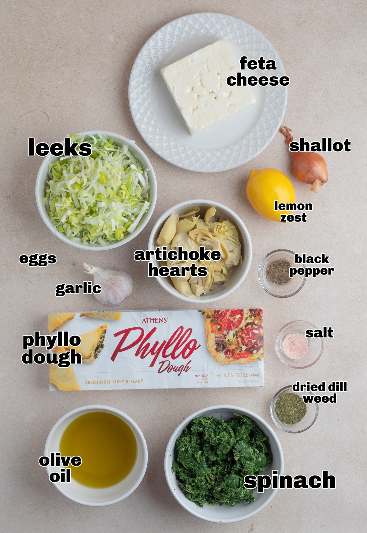 This savory Spanakopita “pie” features a bit of a twist on the traditional filling. Layers of flaky phyllo dough with a rich filling of spinach, artichoke hearts, and sautéed leeks. ingredients