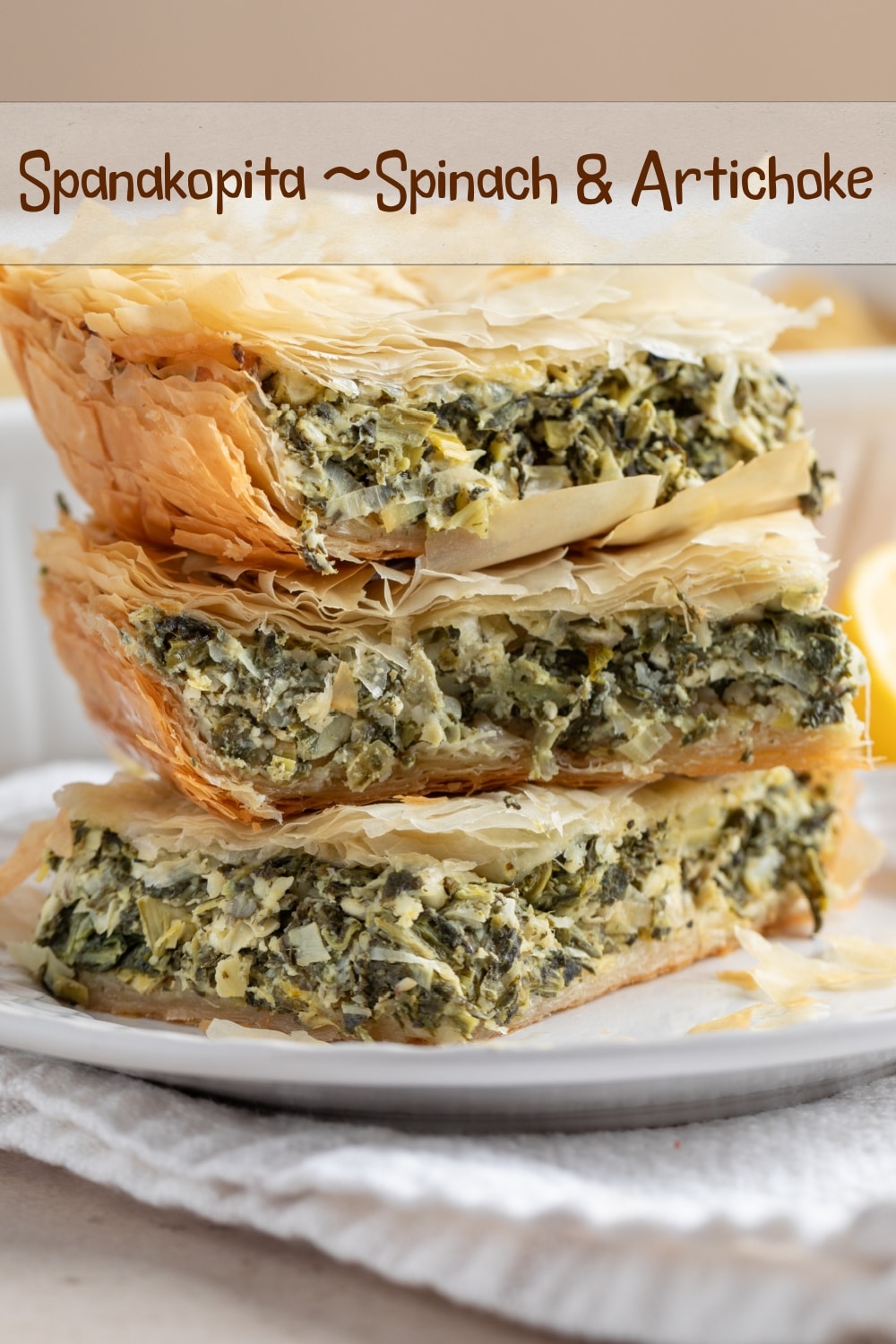 This savory Spanakopita “pie” features a bit of a twist on the traditional filling. Layers of flaky phyllo dough with a rich filling of spinach, artichoke hearts, and sautéed leeks. via @cmpollak1