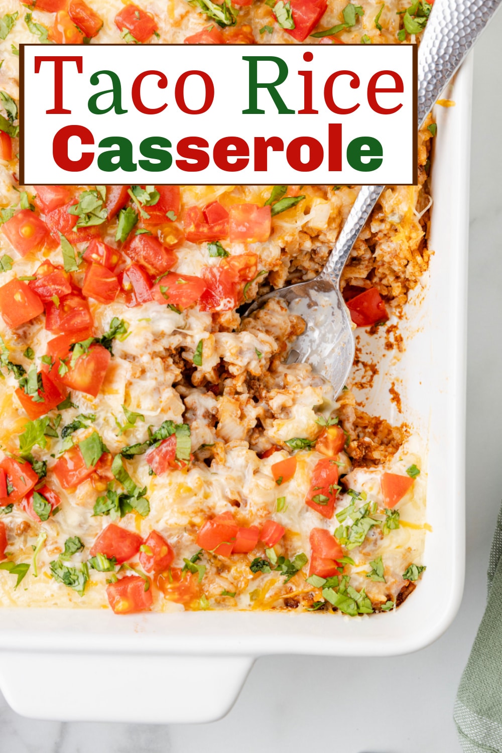 This Taco Rice Casserole is one of the easiest ways to switch up taco night. It’s layered with classic taco flavors and finished off with queso, because it makes everything better! via @cmpollak1