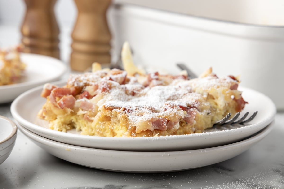 A plated serving of Monte Cristo Casserole on a white dish, ready to enjoy.