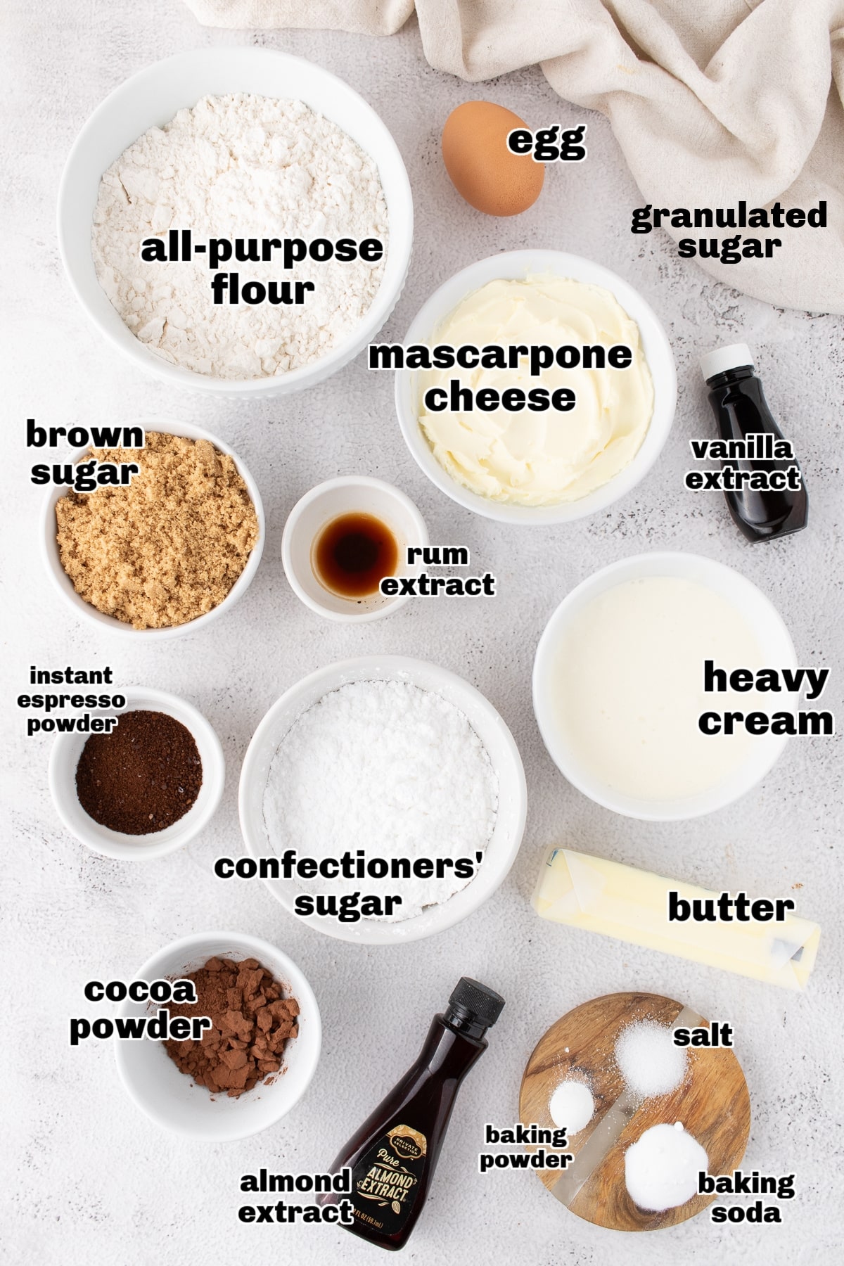 Ingredients prepared for tiramisu cookies. Ingredients laid out on a countertop for making espresso-flavored cookies with mascarpone frosting.