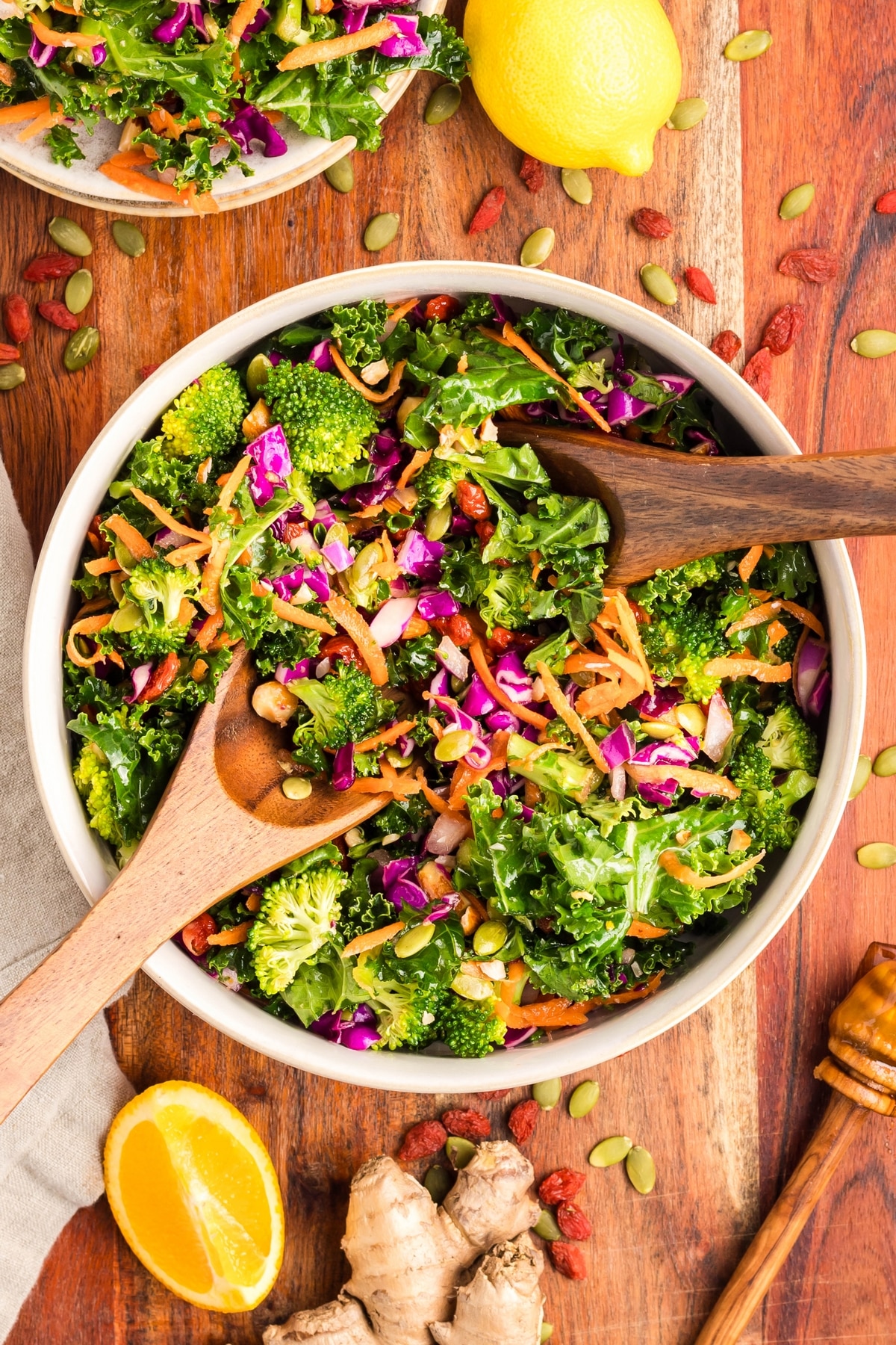 serving spoons in the chopped kale salad 