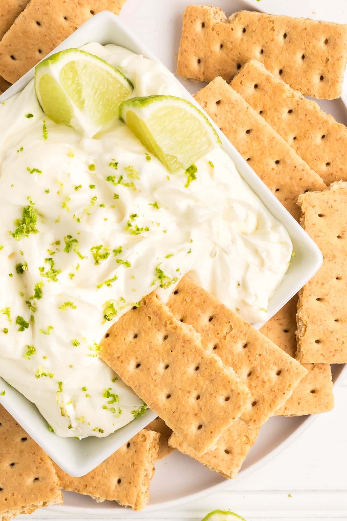Key lime pie dip served with dippers. Key lime pie dip served with graham crackers for dipping.