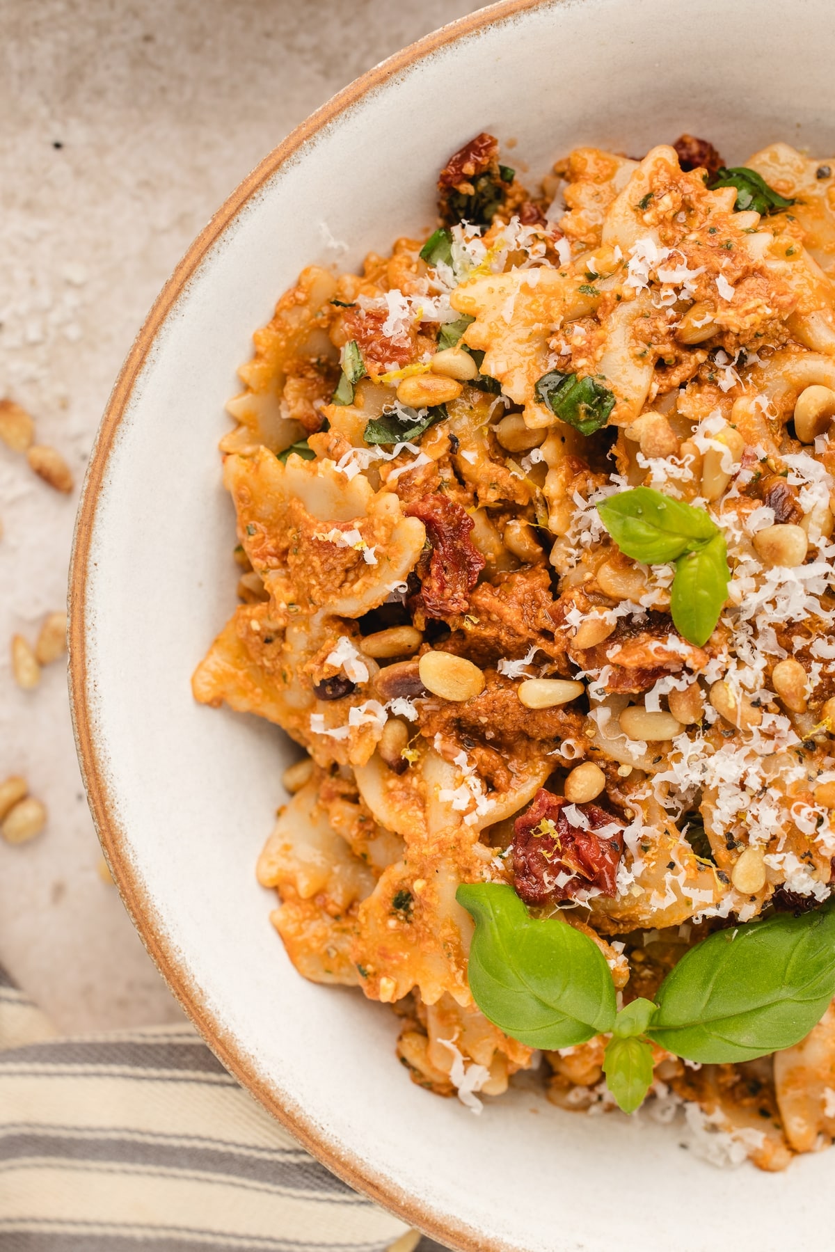 Sun-Dried Tomato Pesto Pasta ready to eat Sun-Dried Tomato Pesto Pasta on a white plate