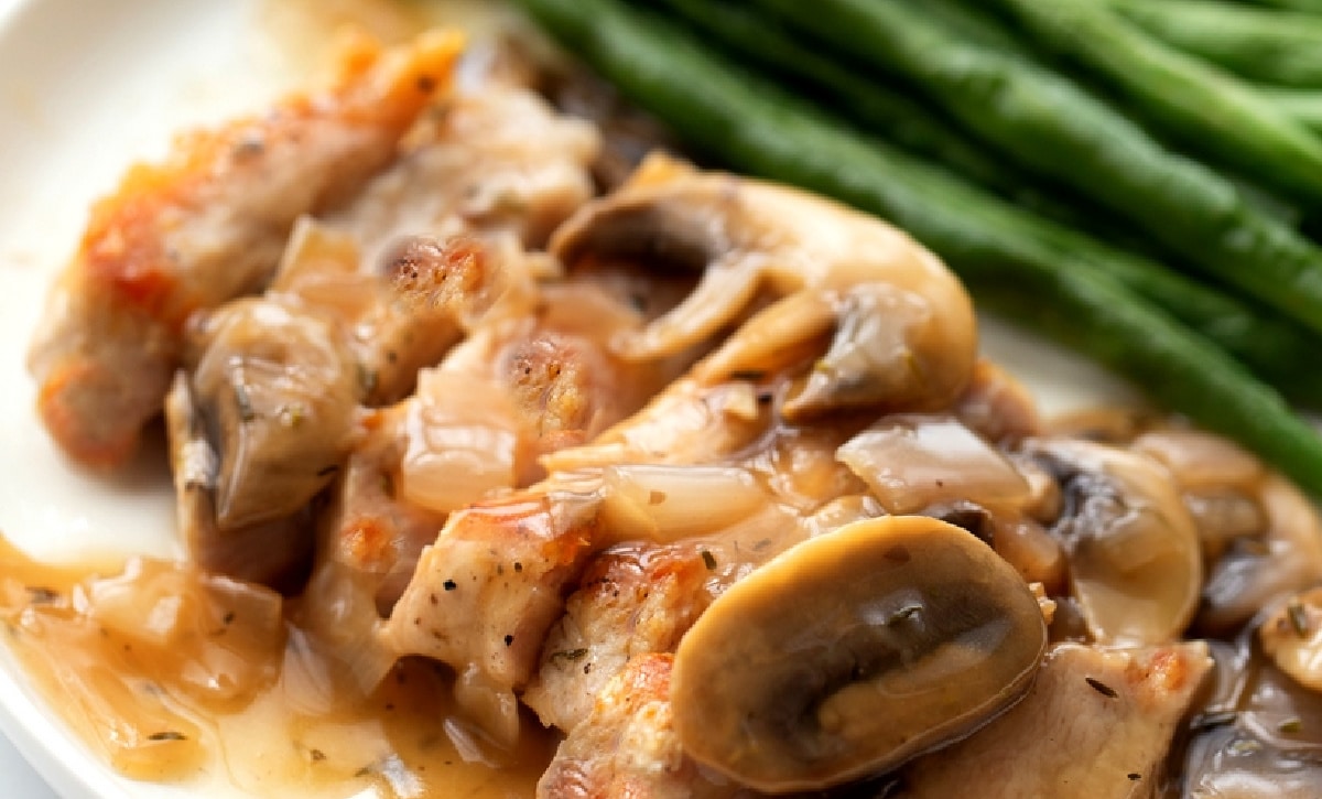 Pork Marsala with boneless pork chops covered in a mushroom Marsala sauce.