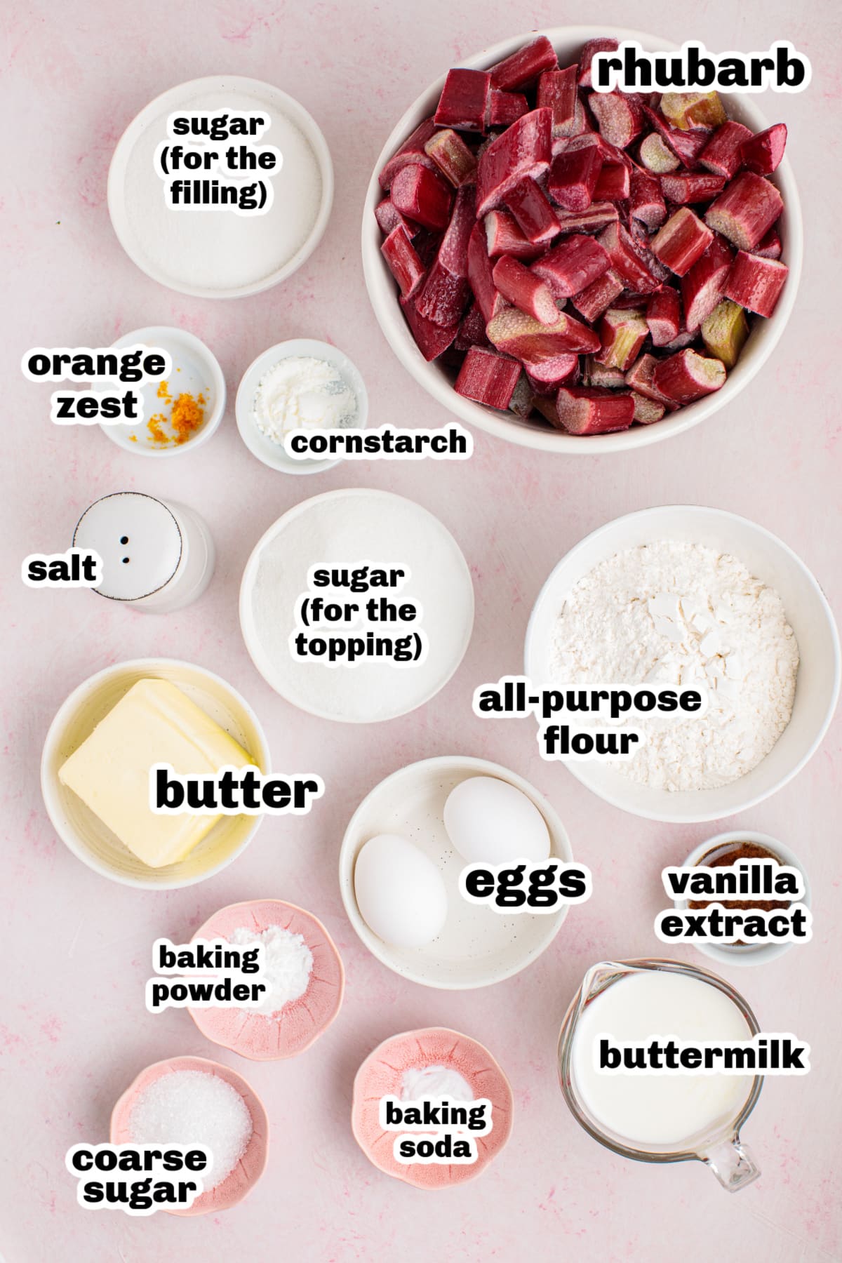 Flat lay of measured ingredients for rhubarb cobbler, including rhubarb, flour, sugar, butter, and buttermilk.