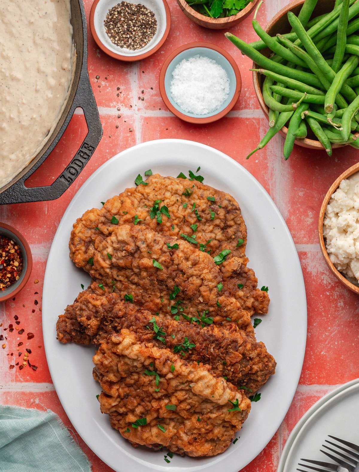 Platter of freshly fried chicken fried steaks without gravy