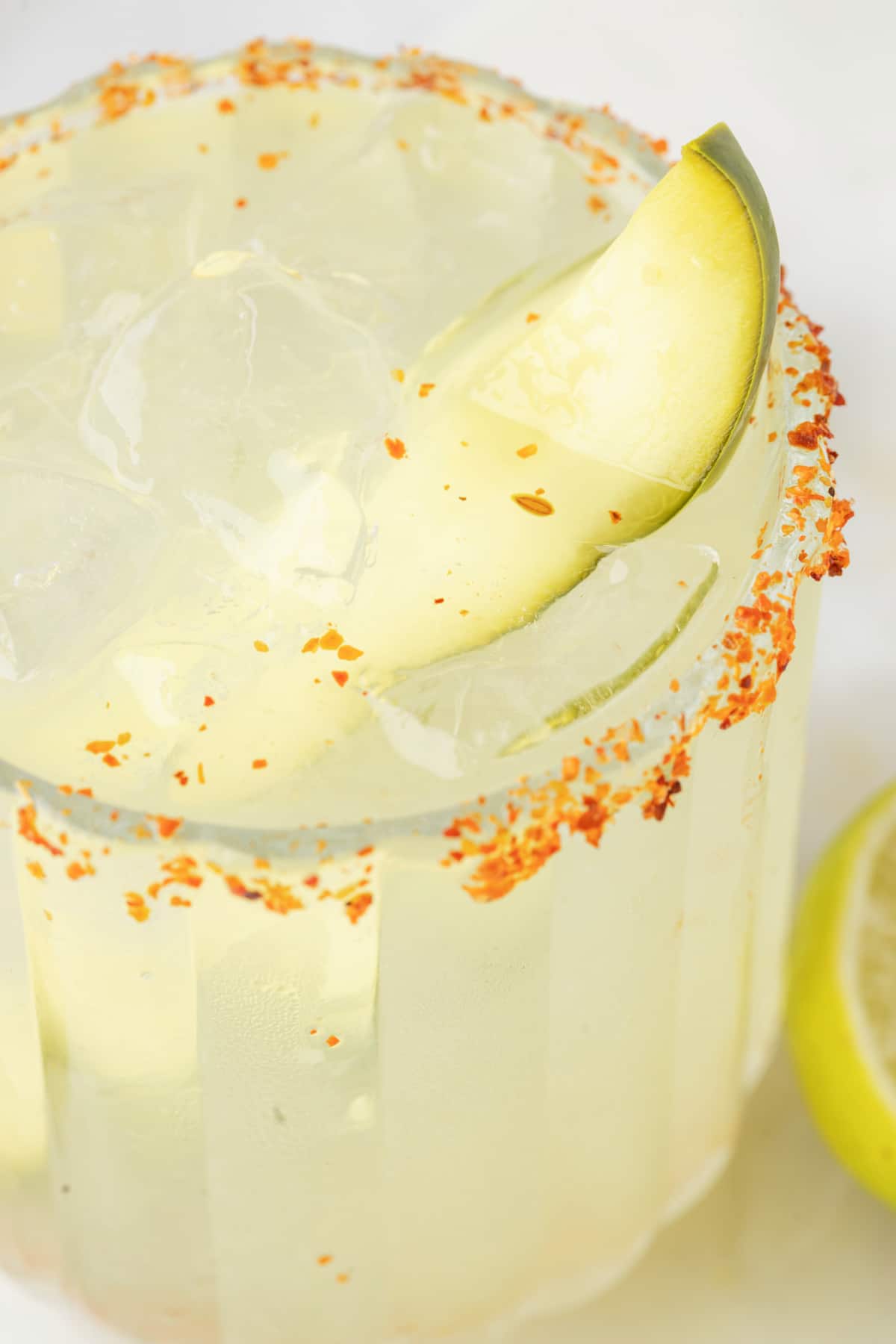 Margarita with Tajín-Rimmed Glass Overhead close-up of margarita with detailed Tajín rim
