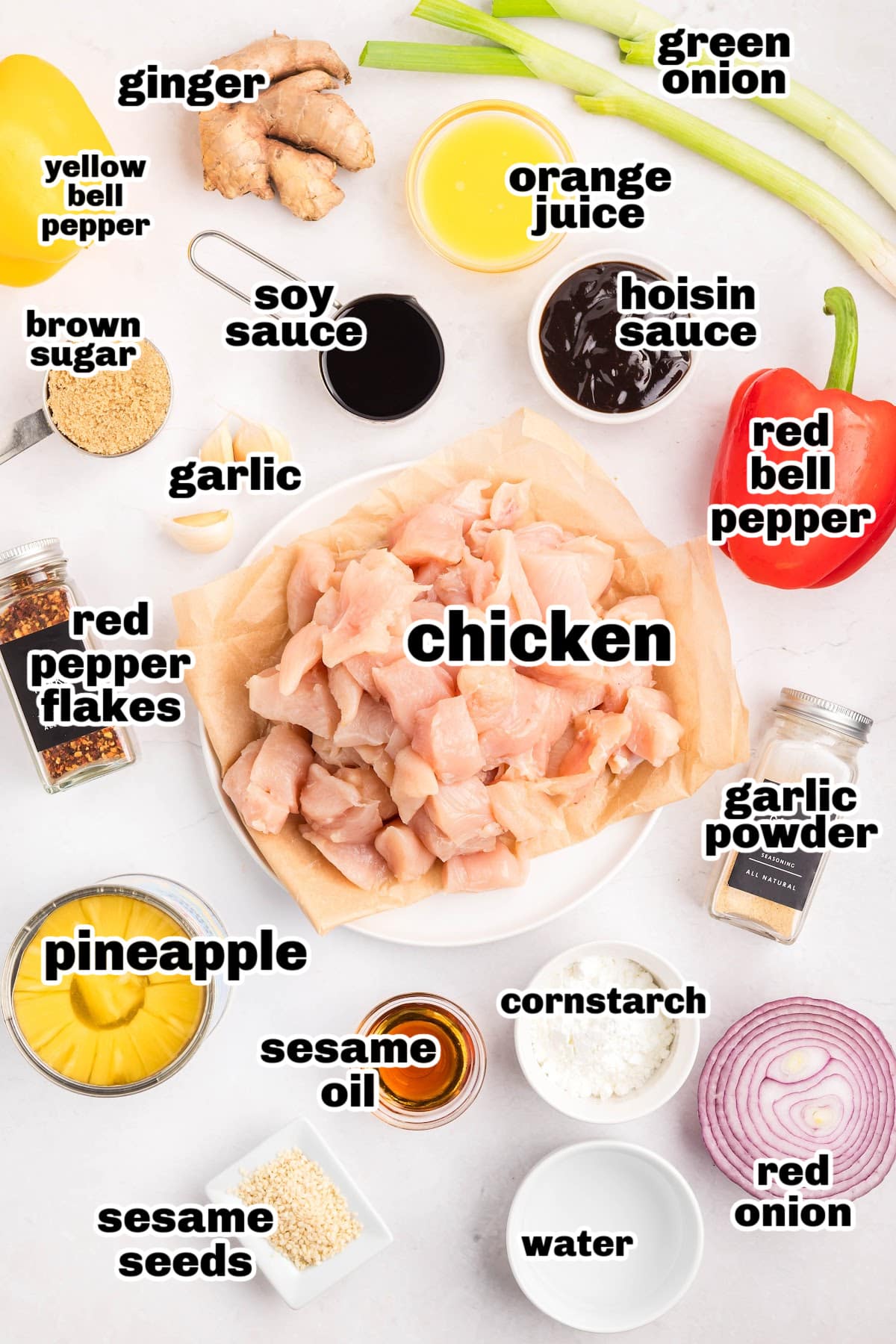 Ingredients prepped for slow cooker pineapple chicken Ingredients for crockpot Hawaiian chicken laid out: soy, hoisin, pineapple, peppers, chicken