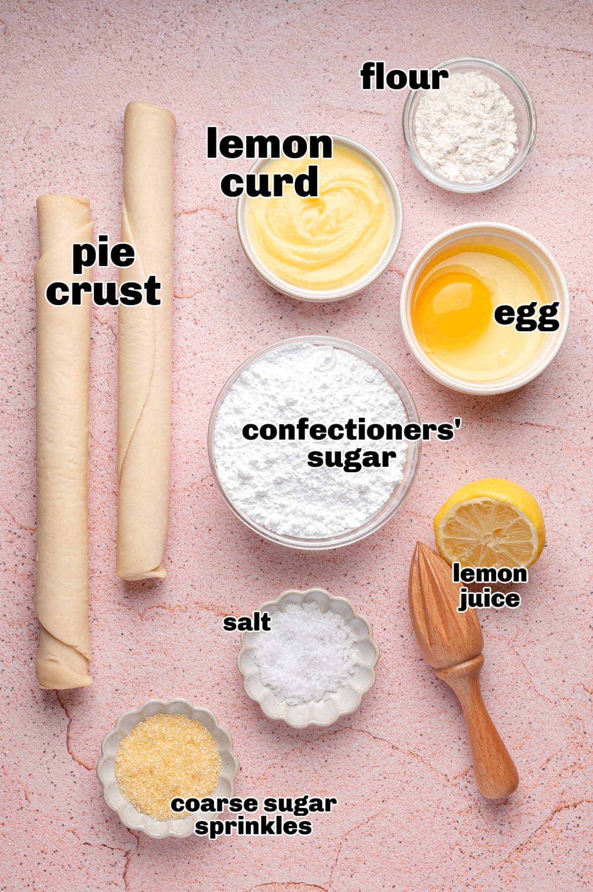 Overhead shot of ingredients for homemade lemon pop tarts, including pie crust, lemon curd, egg, and sugar