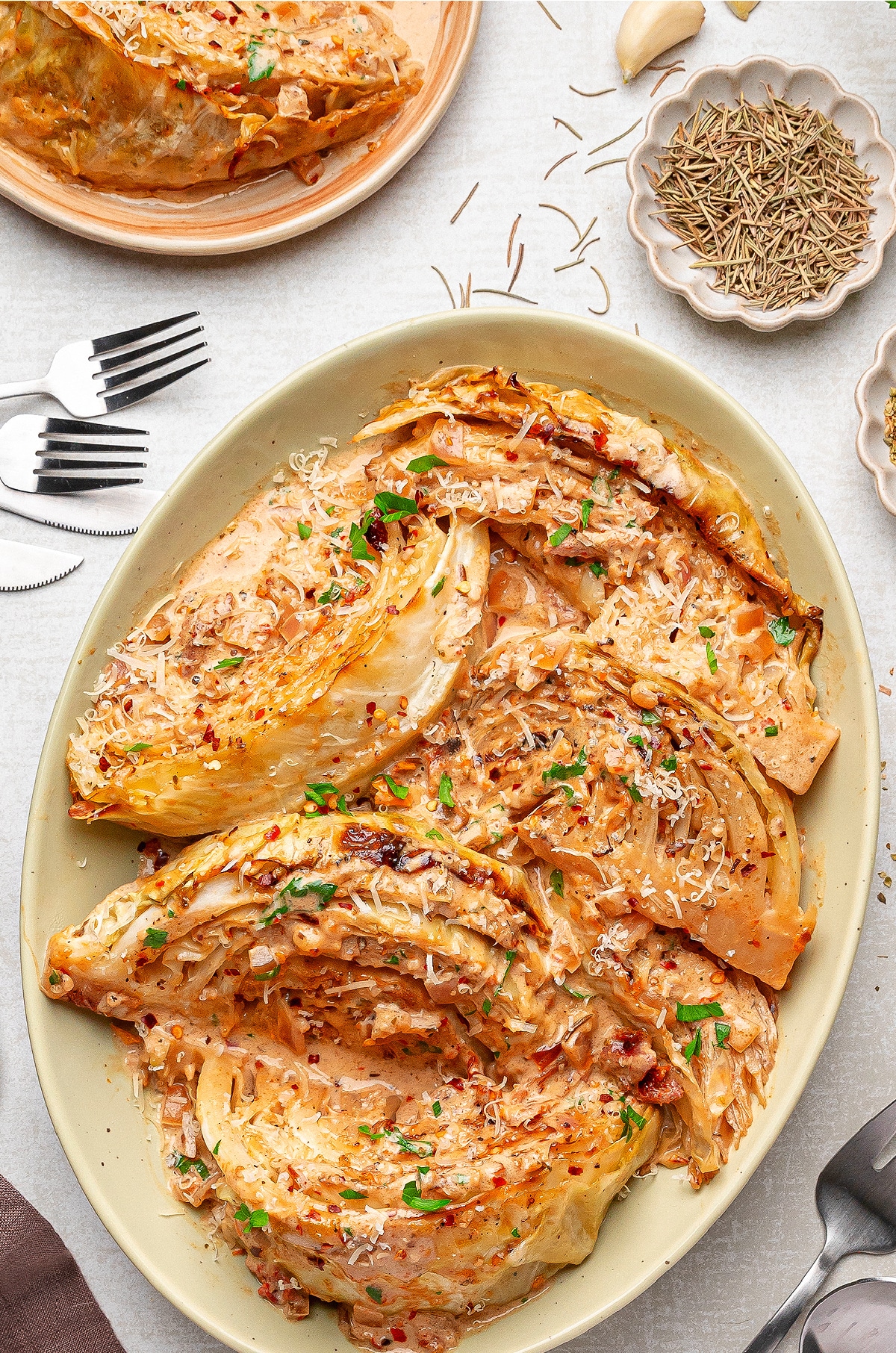 Tuscan-style cabbage recipe plated with creamy sauce, caramelized edges, and fresh herbs for a hearty comfort food side.