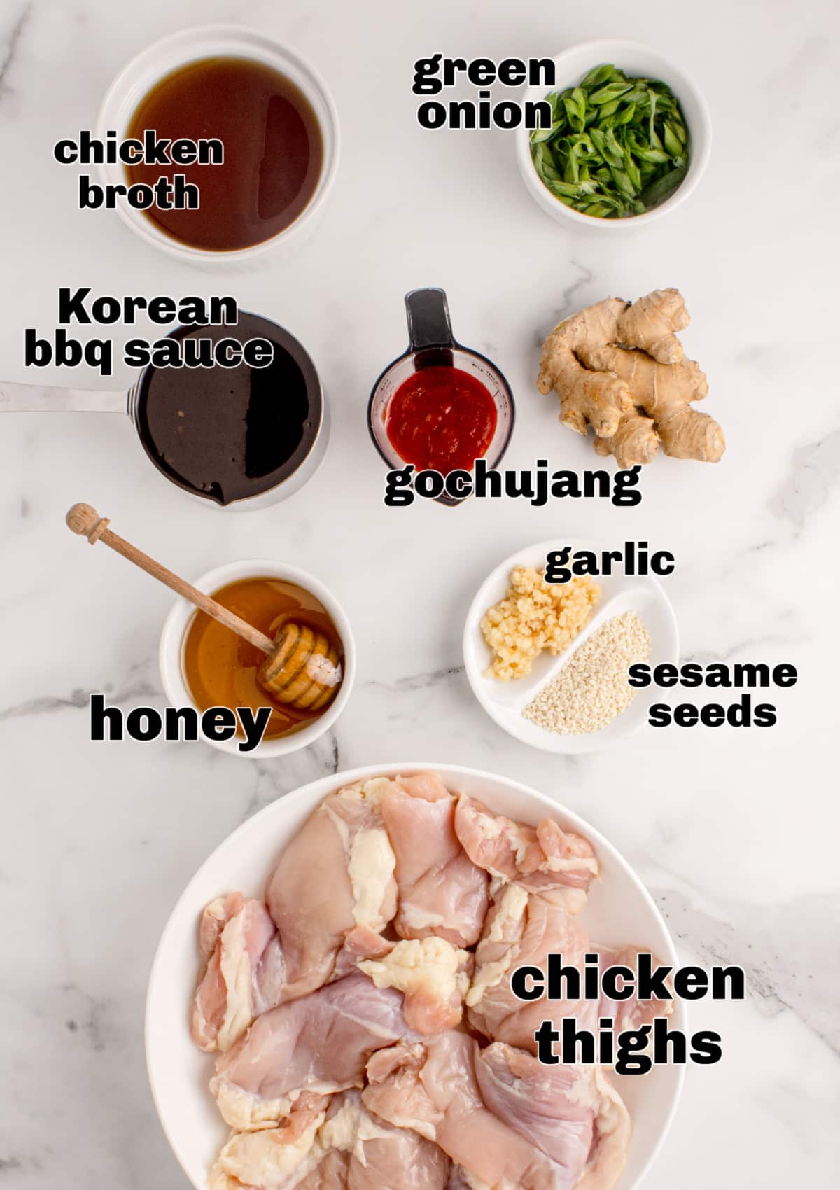 Ingredients for Korean BBQ chicken including chicken thighs, gochujang, honey, garlic, ginger, and broth.