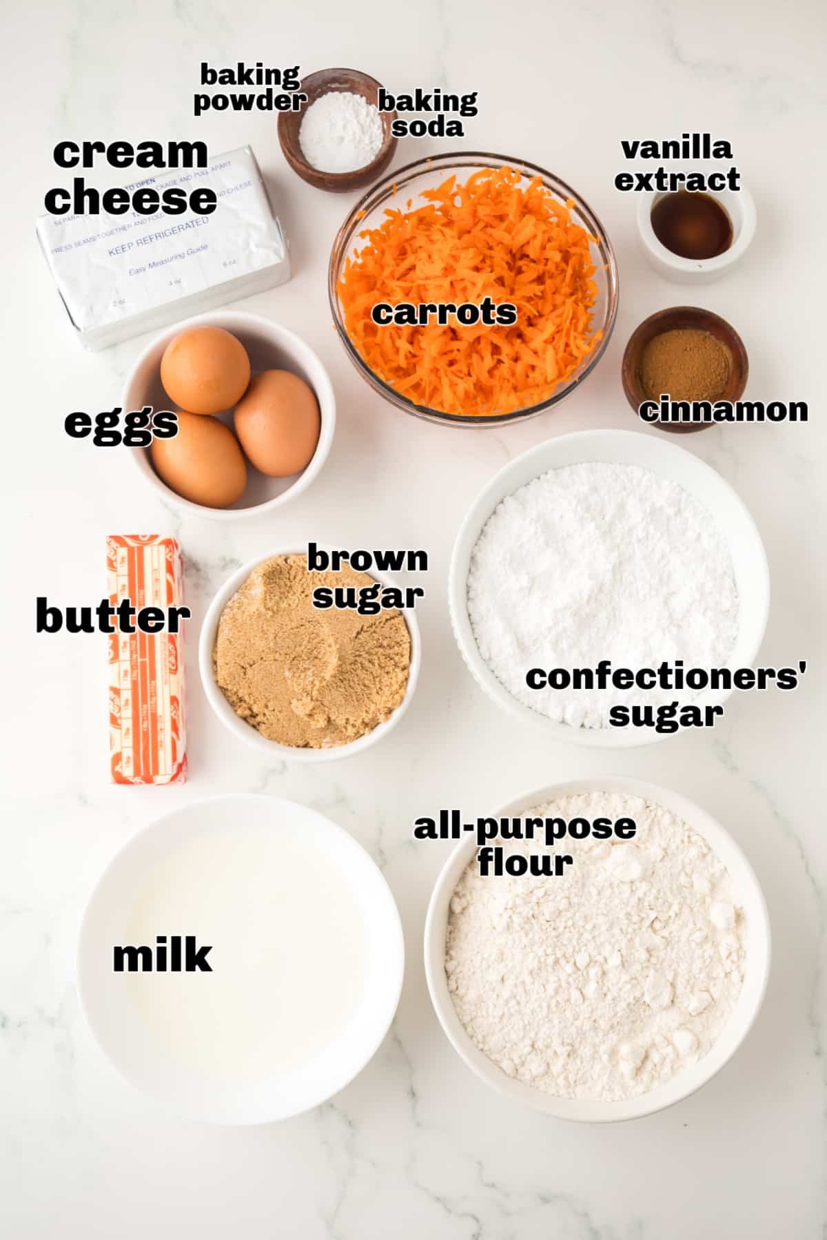 brown butter carrot bundt cake ingredients Ingredients for brown butter carrot bundt cake with cream cheese frosting arranged on a counter.