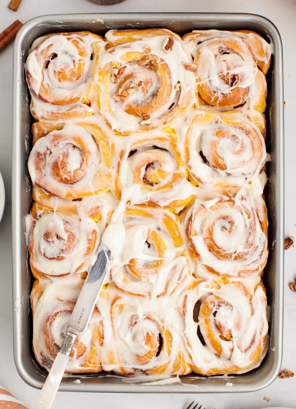 butternut-squash-cinnamon-rolls-fresh Fresh pan of butternut squash cinnamon rolls with cream cheese glaze, ready to serve.