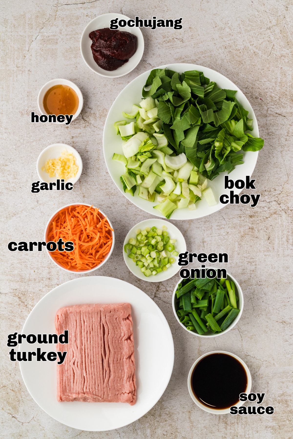 Gochujang stir fry recipe ingredients. Ingredients for a gochujang stir fry recipe with turkey, carrots, bok choy, and soy sauce.