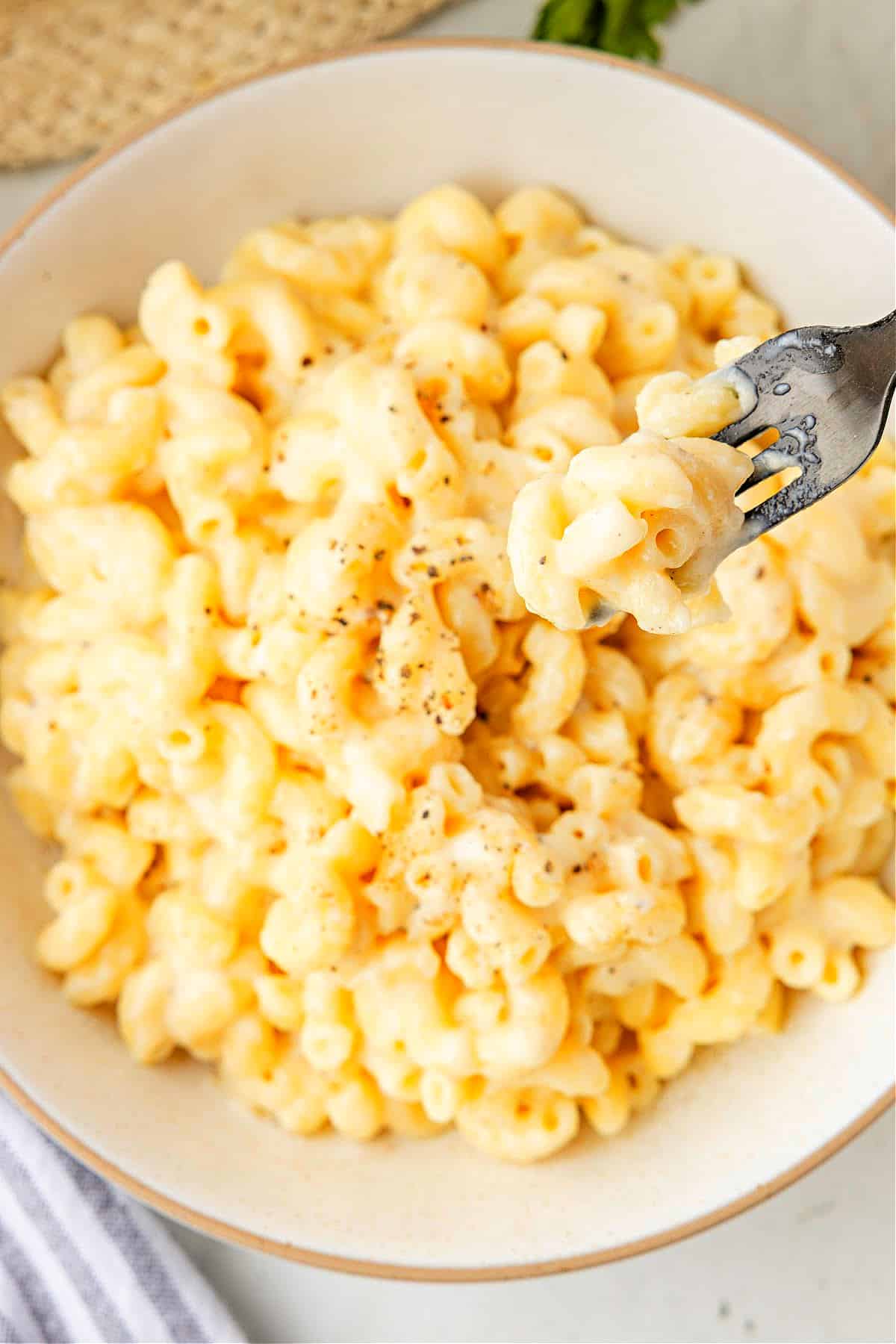 Blended cottage cheese sauce for mac and cheese. Cottage cheese mac and cheese sauce blended until smooth for a creamy, high protein pasta base.