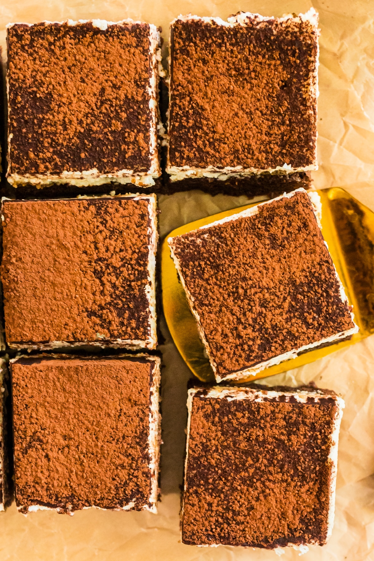 easy tiramisu dessert squares with cocoa powder topping and mascarpone filling.