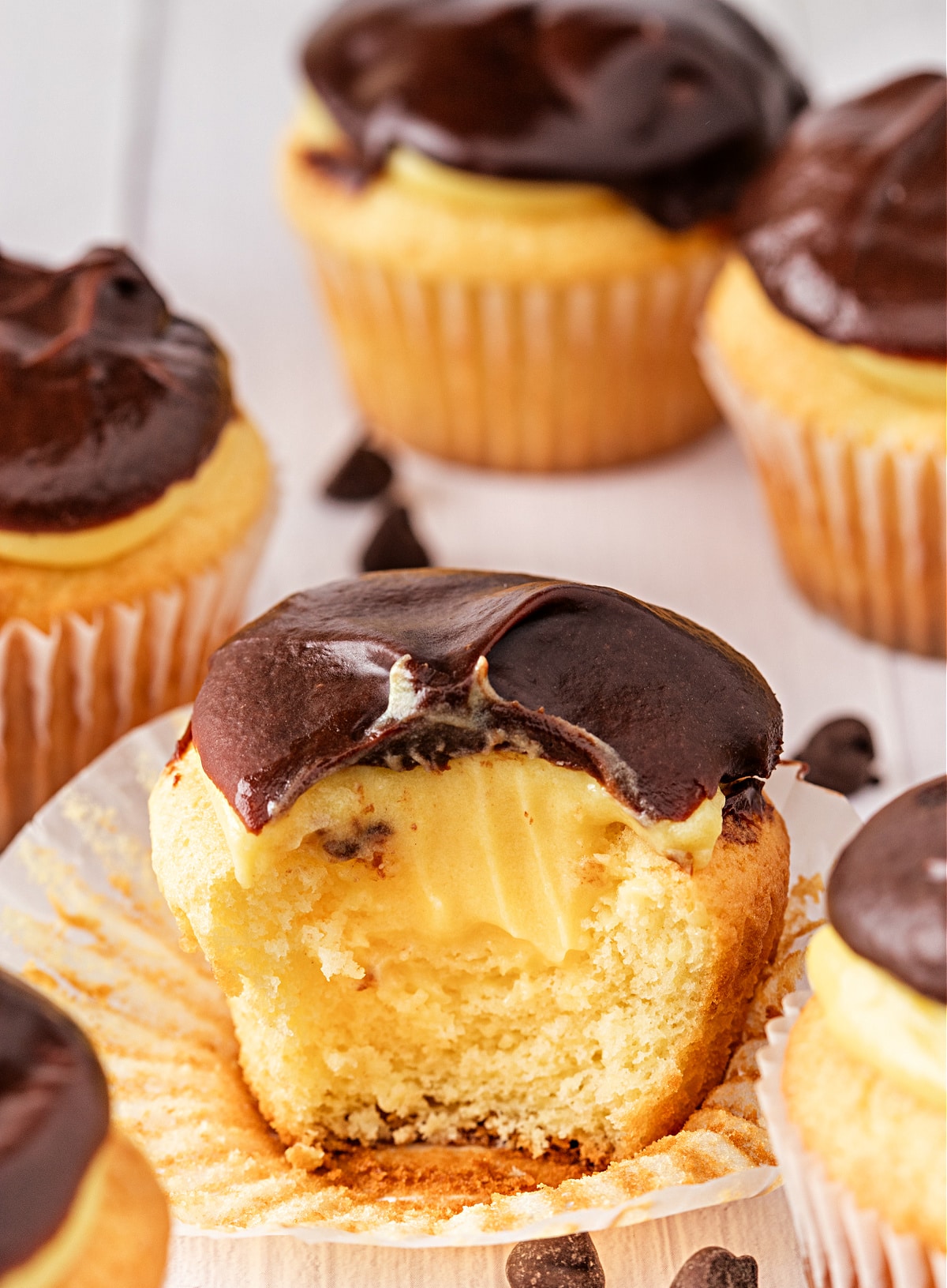 Boston Cream Pie Cupcake with Ganache and Cream Filling Boston Cream Pie Cupcake made with cake mix, showing vanilla pudding filling and chocolate ganache
