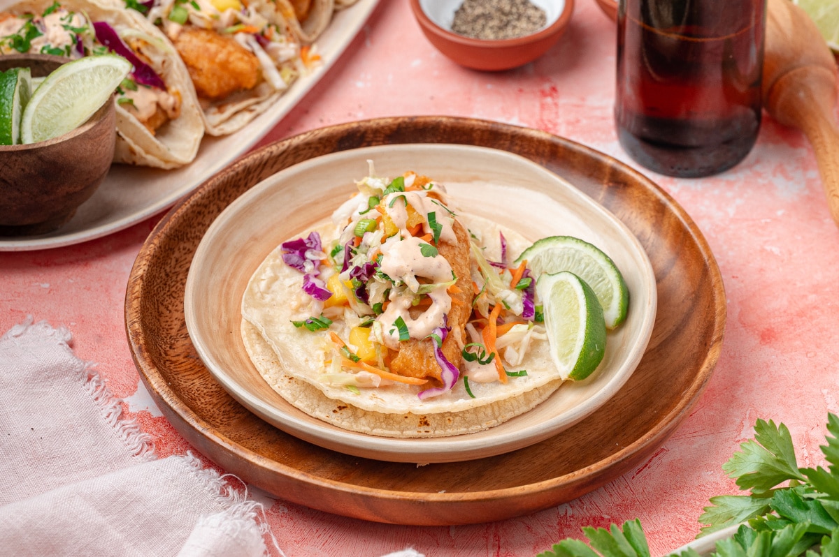 Fried cod tucked into corn tortillas with mango slaw, chipotle lime sauce, and fresh lime wedges.