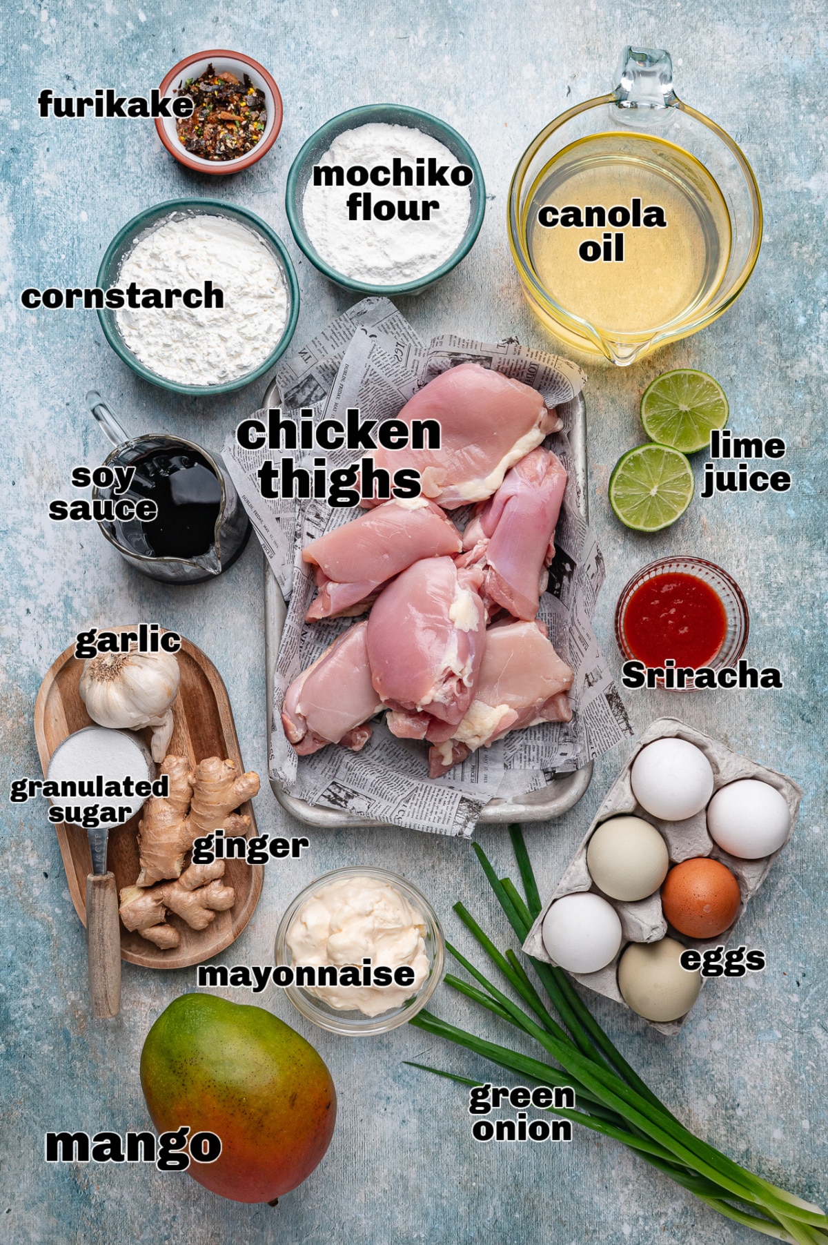 Mochiko chicken ingredients flat lay ingredients for mochiko chicken including sweet rice flour and mango