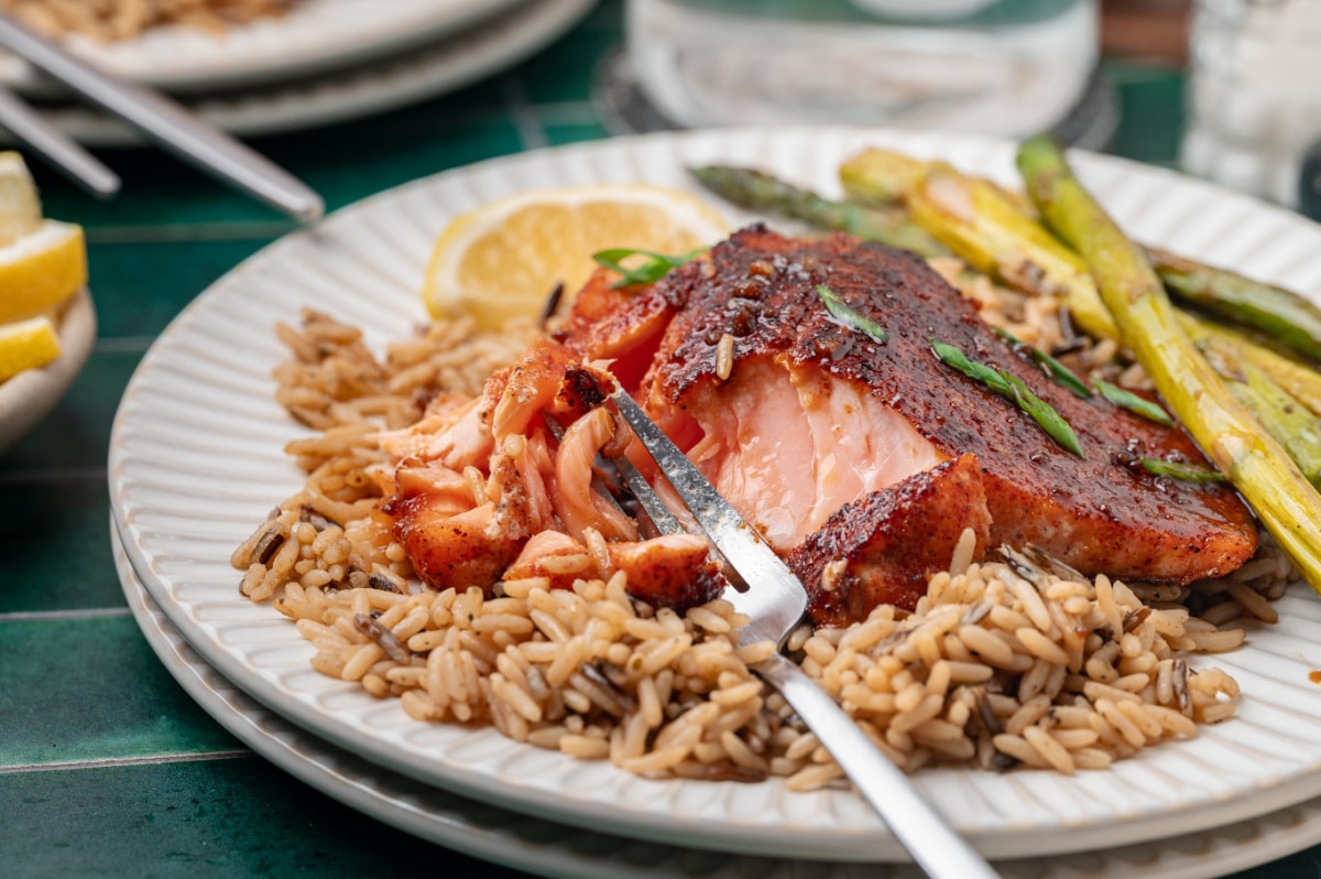 Bourbon Glazed Salmon Flaky Texture Close Up bourbon glazed salmon with a flaky center showing tender pan seared texture and glossy glaze
