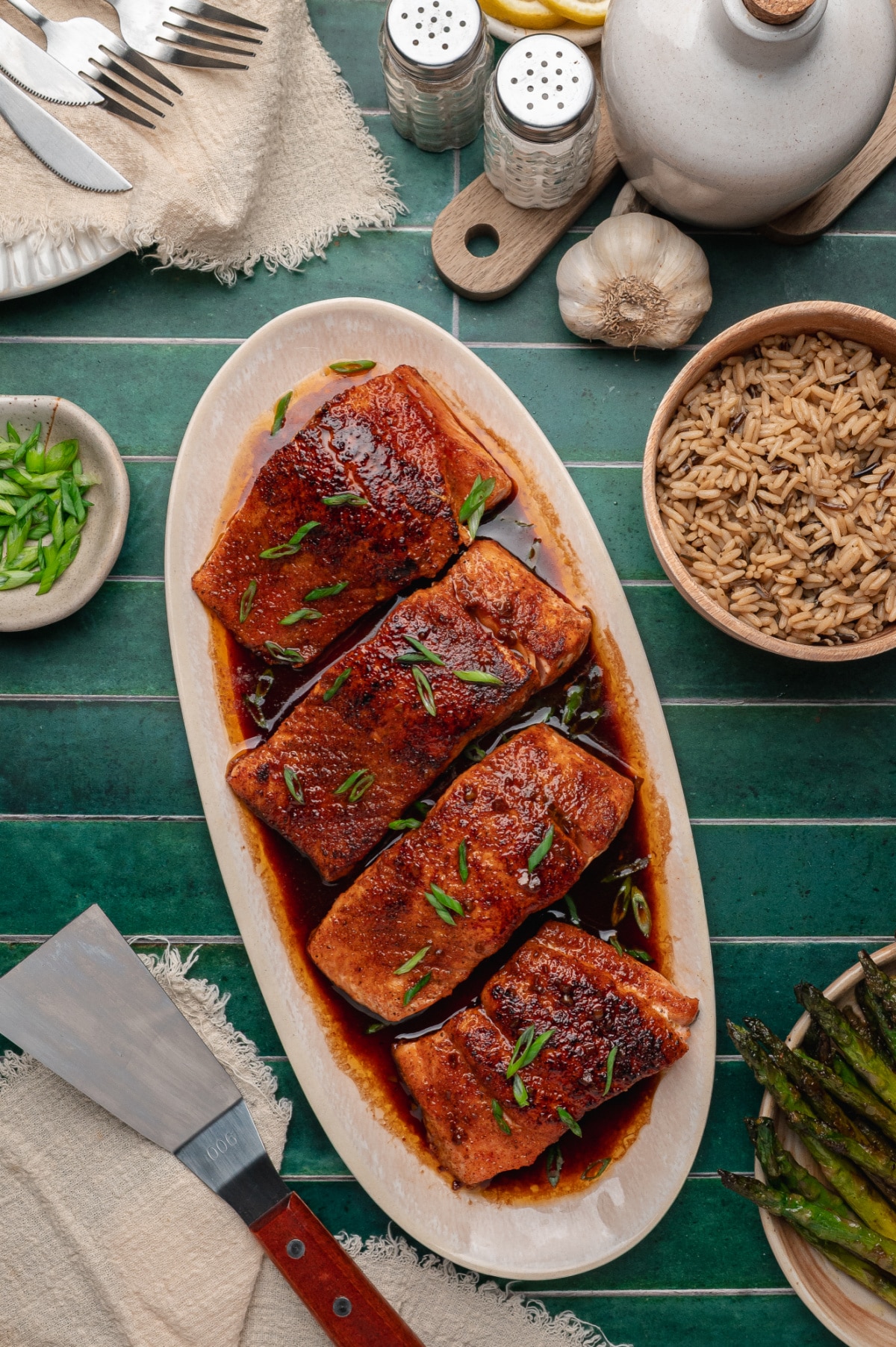 Bourbon Glazed Salmon Platter bourbon glazed salmon on a platter with a rich glossy glaze and green onion garnish