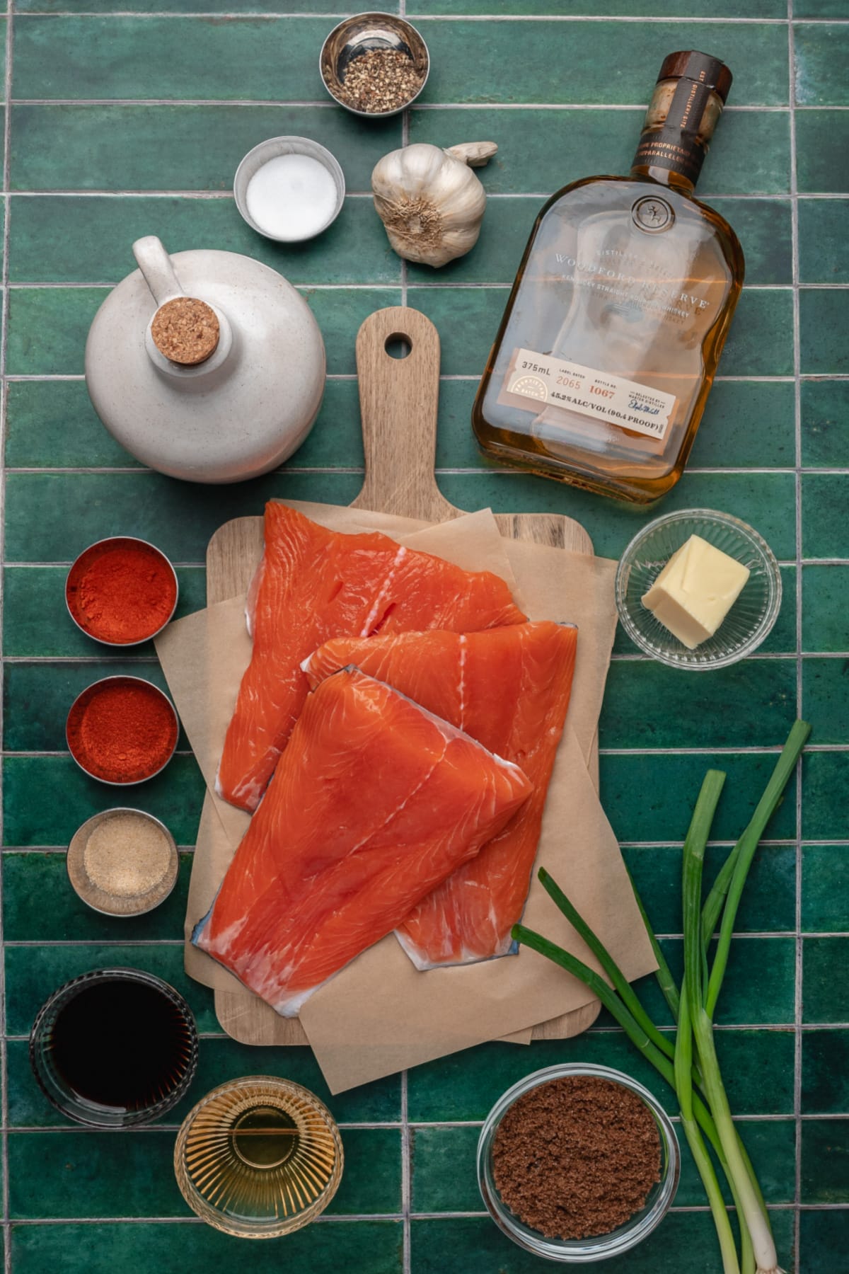 Ingredients for Bourbon Salmon Glaze fresh salmon fillets with bourbon, brown sugar, soy sauce, garlic, and spices for glaze